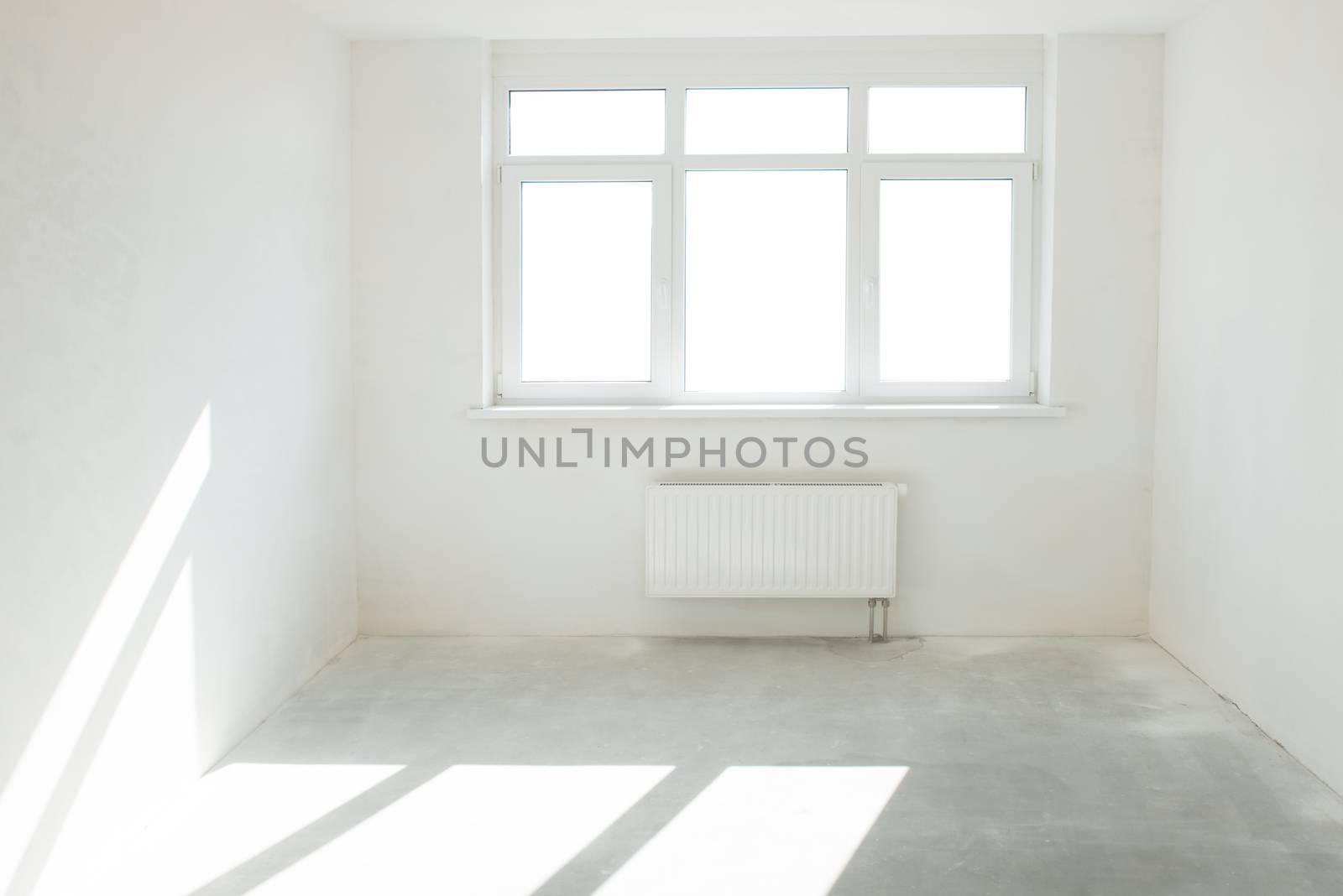 White room with window full of light