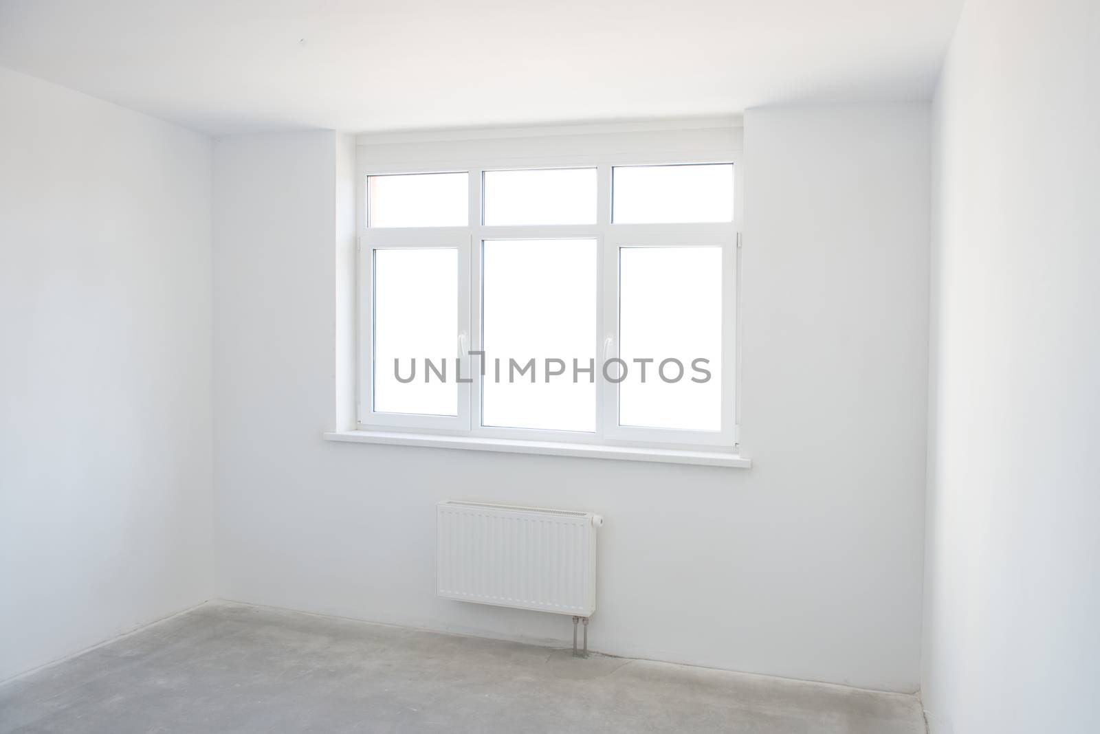 White room with window full of light