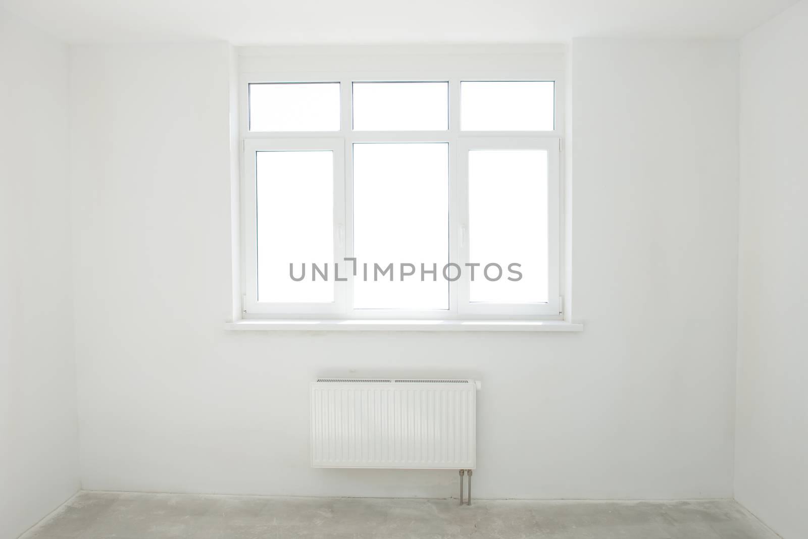 White room with window full of light