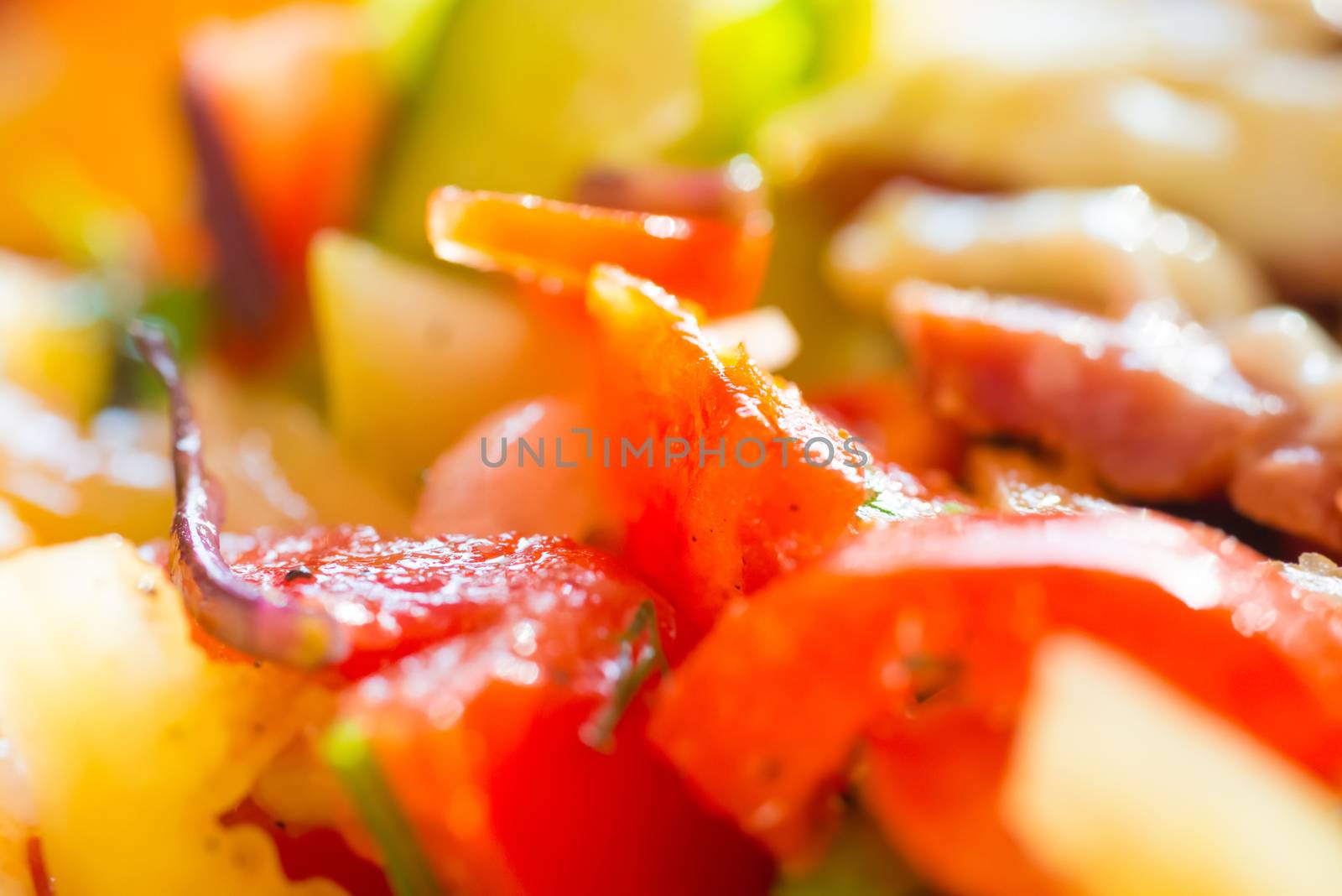 Fresh salad with tomato and fresh vegetable close up