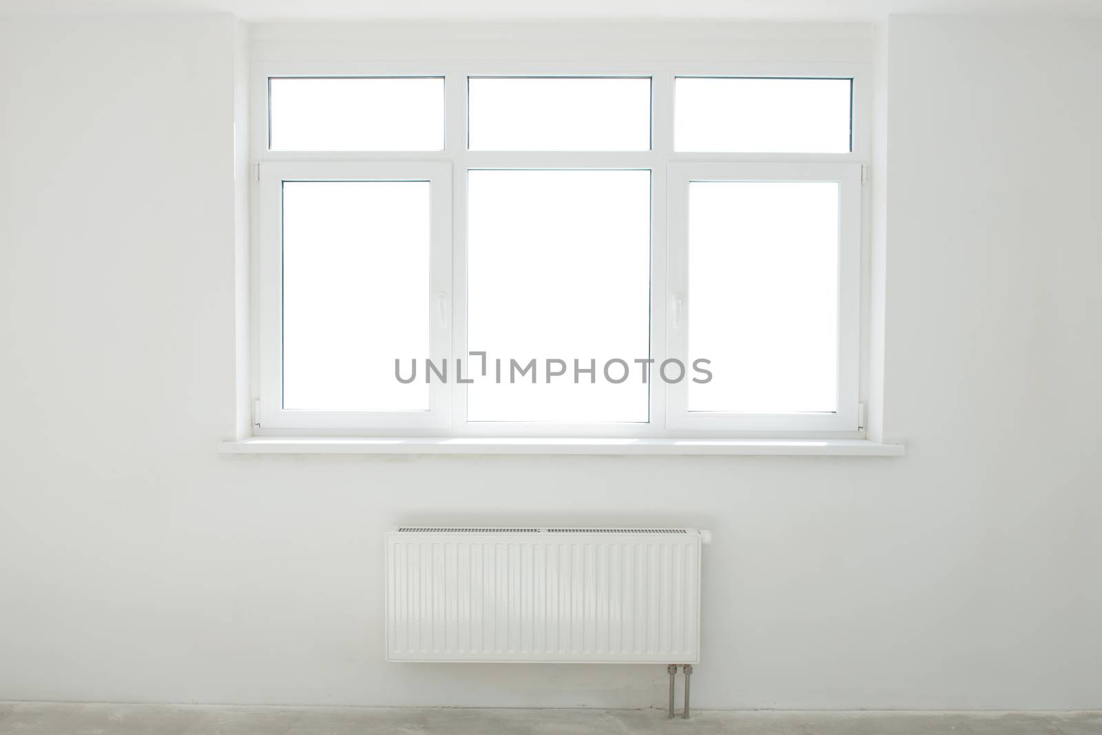 White room with window full of light