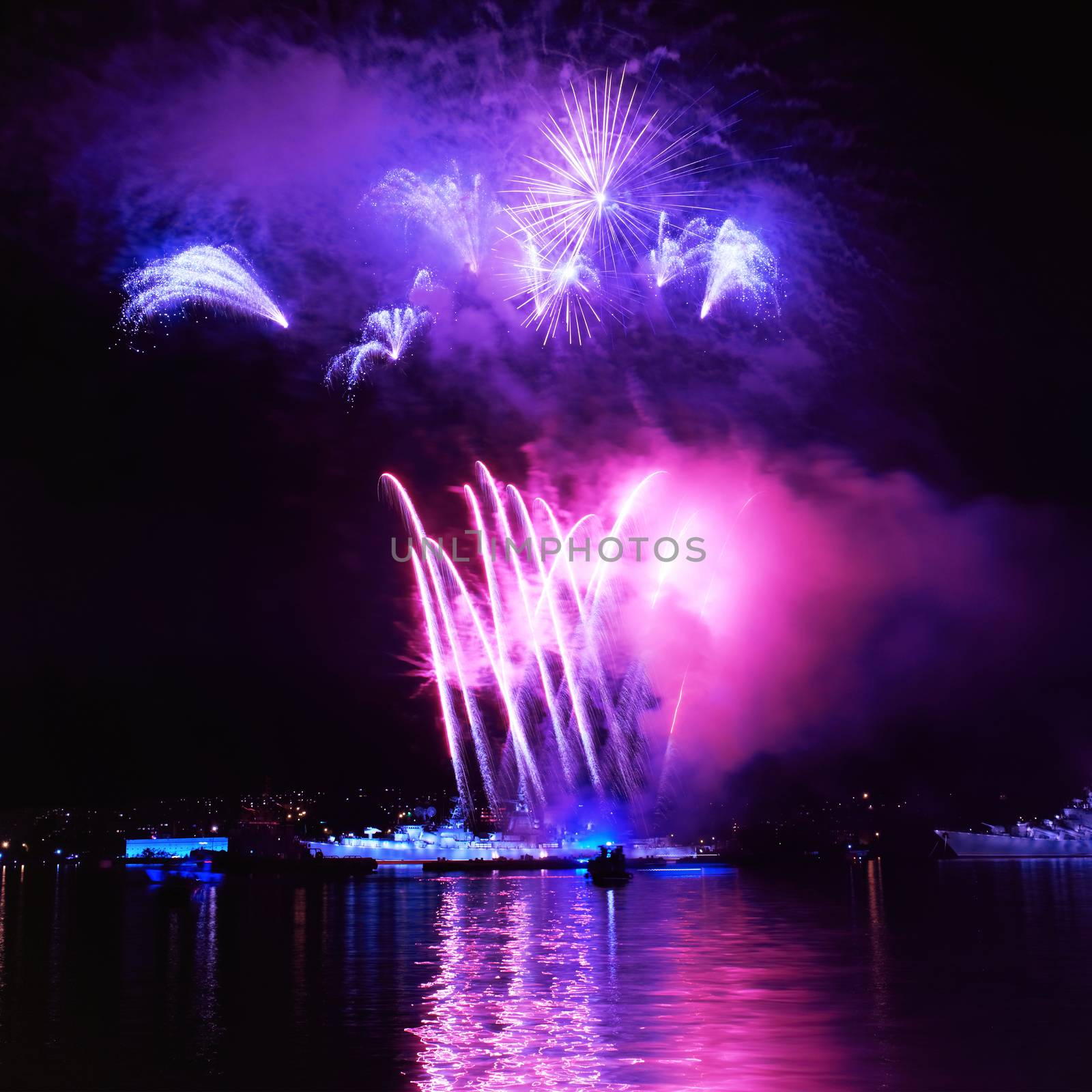 Blue colorful fireworks on the black sky background