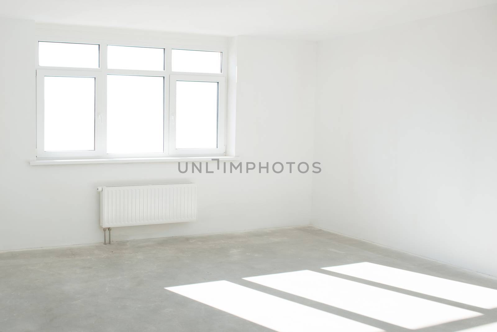 White room with window full of light