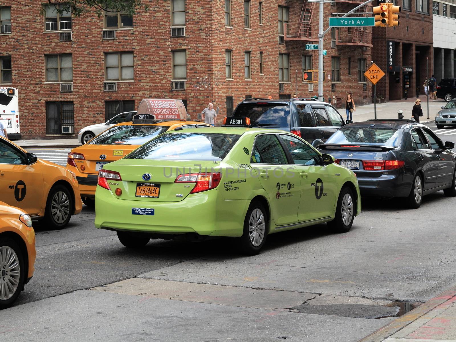 A special green "Boro Taxi" cab in New York City.