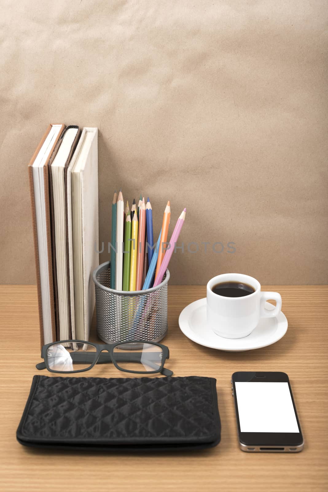 office desk : coffee with phone,stack of book,eyeglasses,wallet, by ammza12