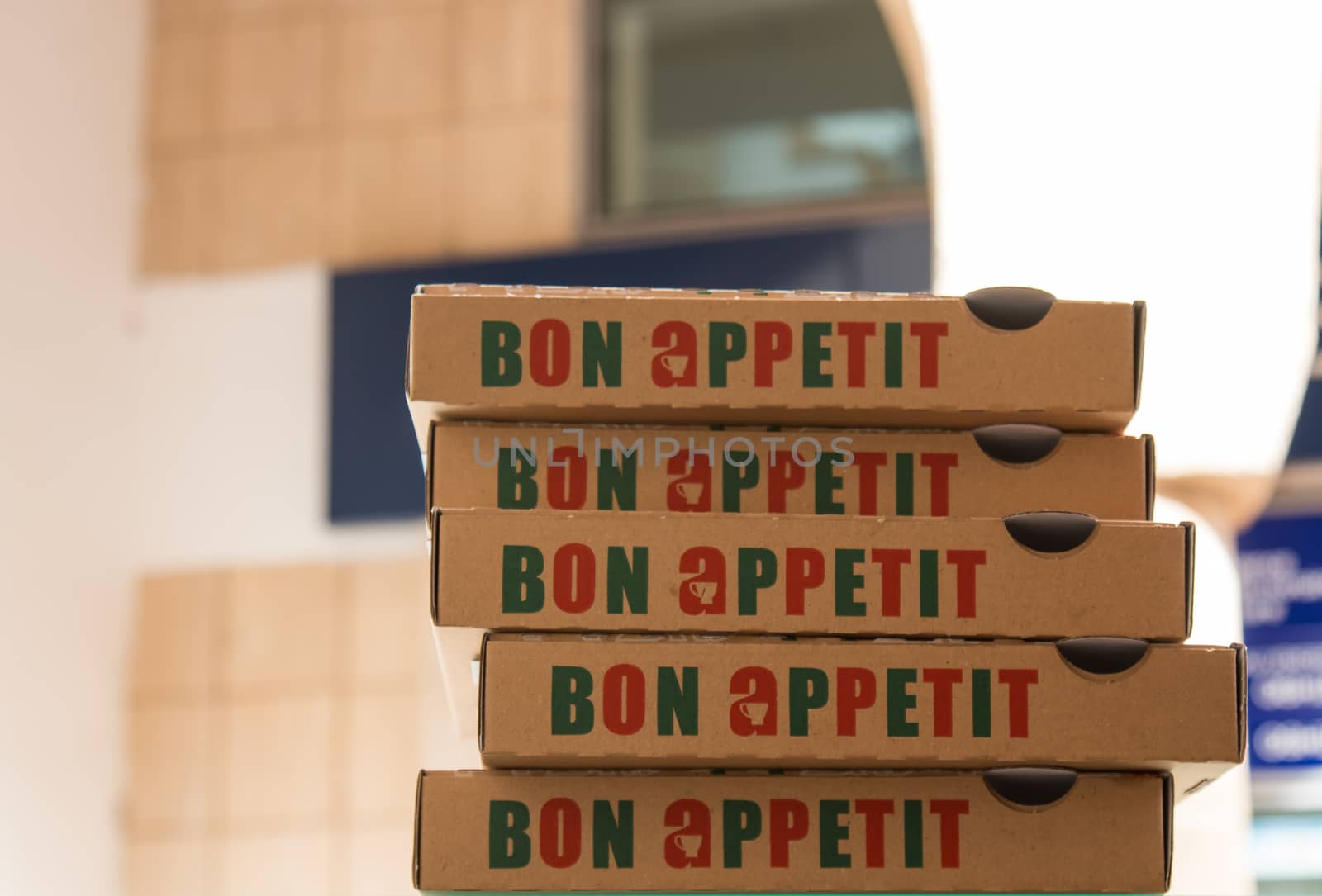 Pile of Bon Appetit boxes for pizza by YassminPhoto