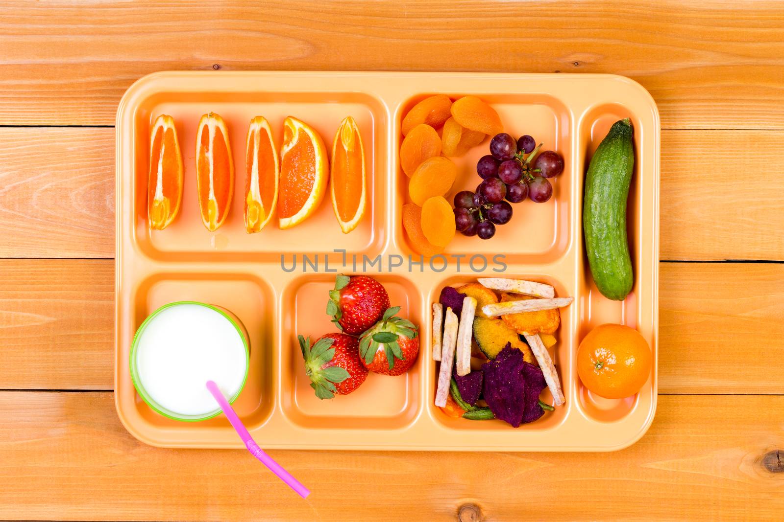 Fruit sampler in lunch tray with milk by coskun