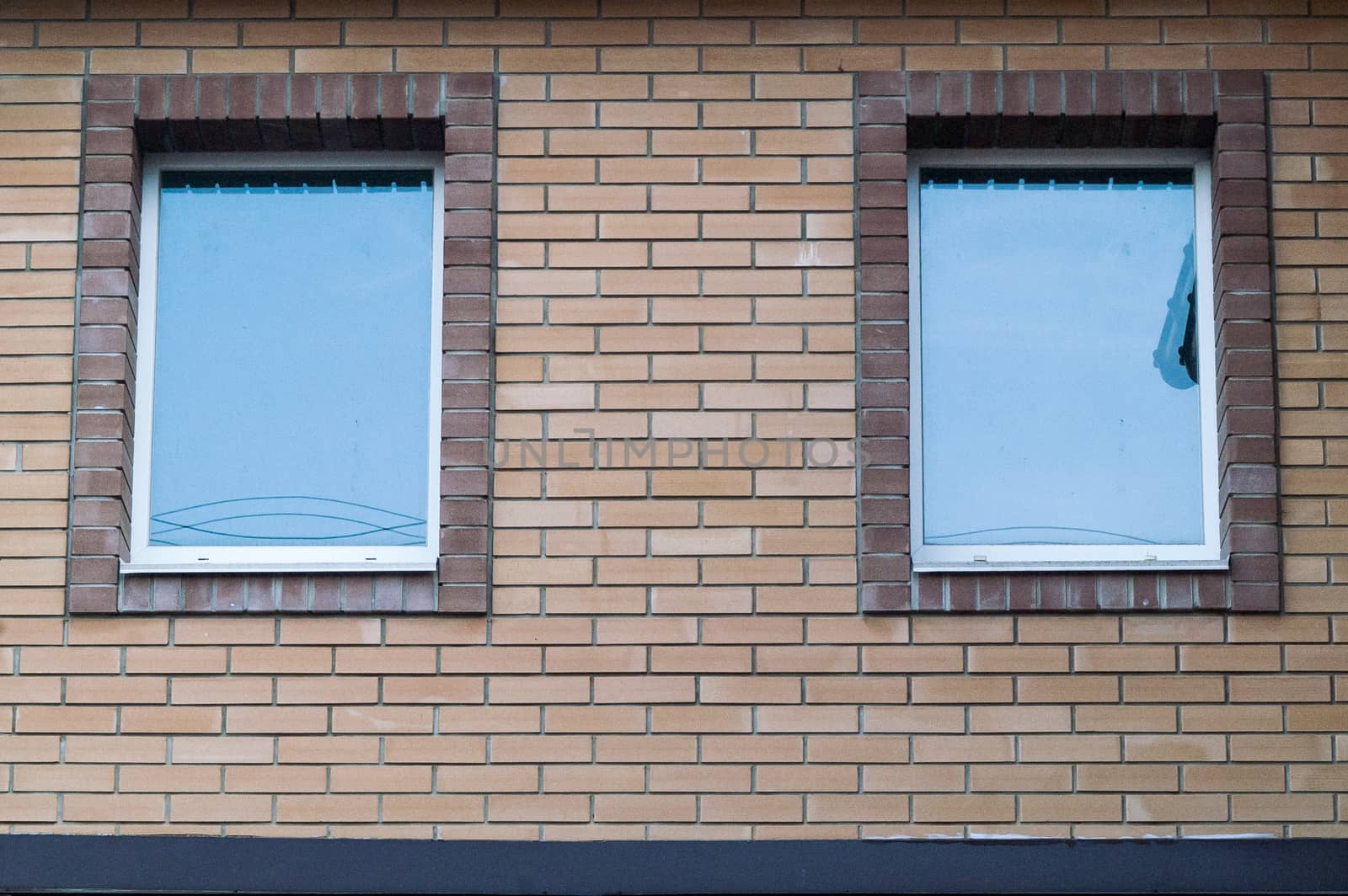 closed window in a brick old house