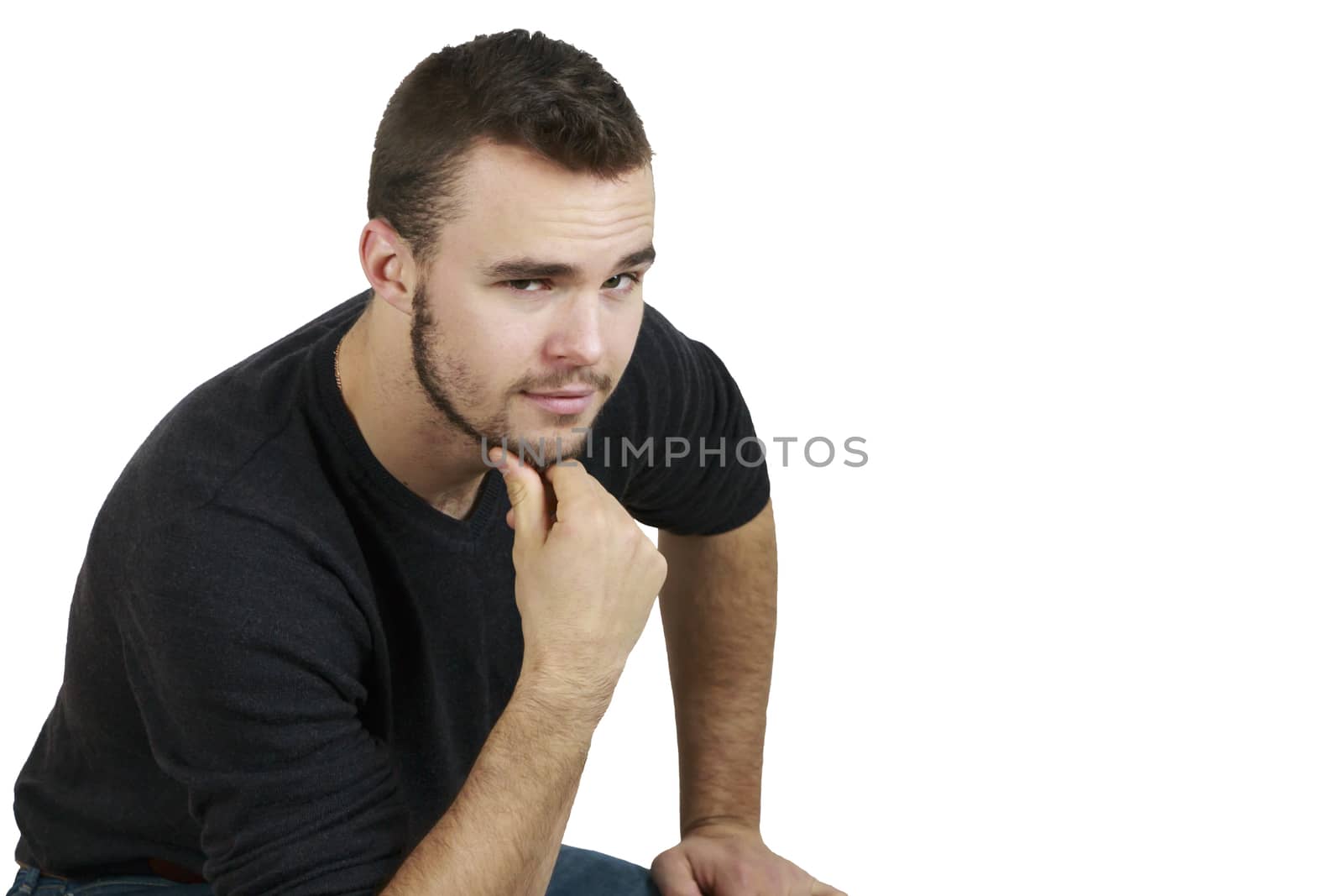 Young Man With Hand on Chin on White Background Background