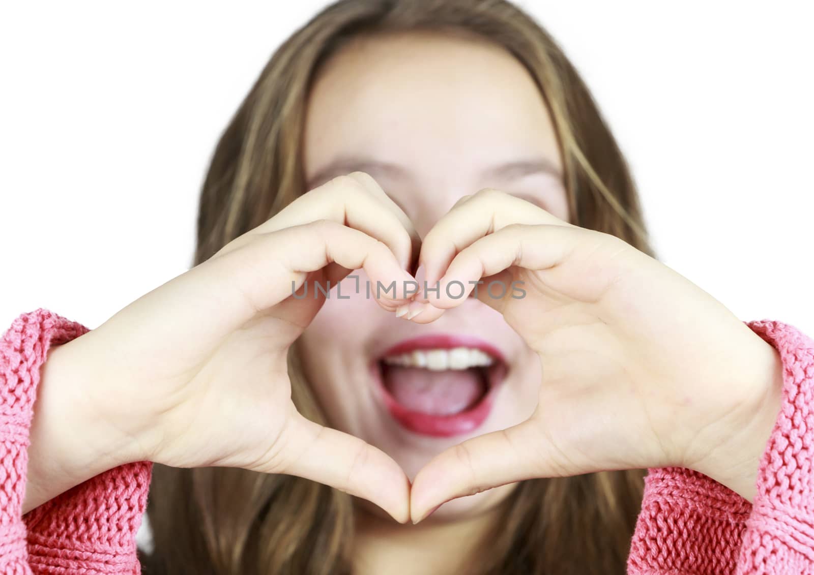 Pretty Young Girl Making a heart with Hands