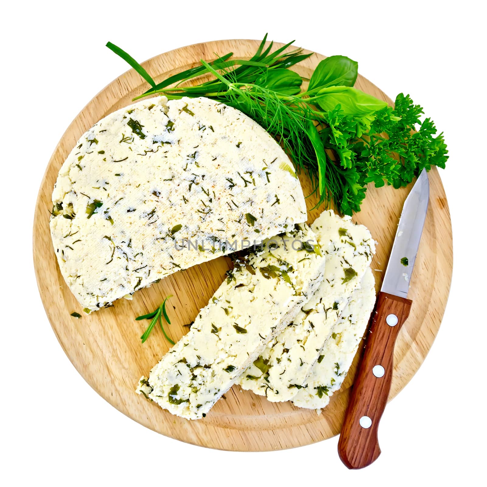 Homemade round cheese with herbs and spices, knife on a round wooden board isolated on white background