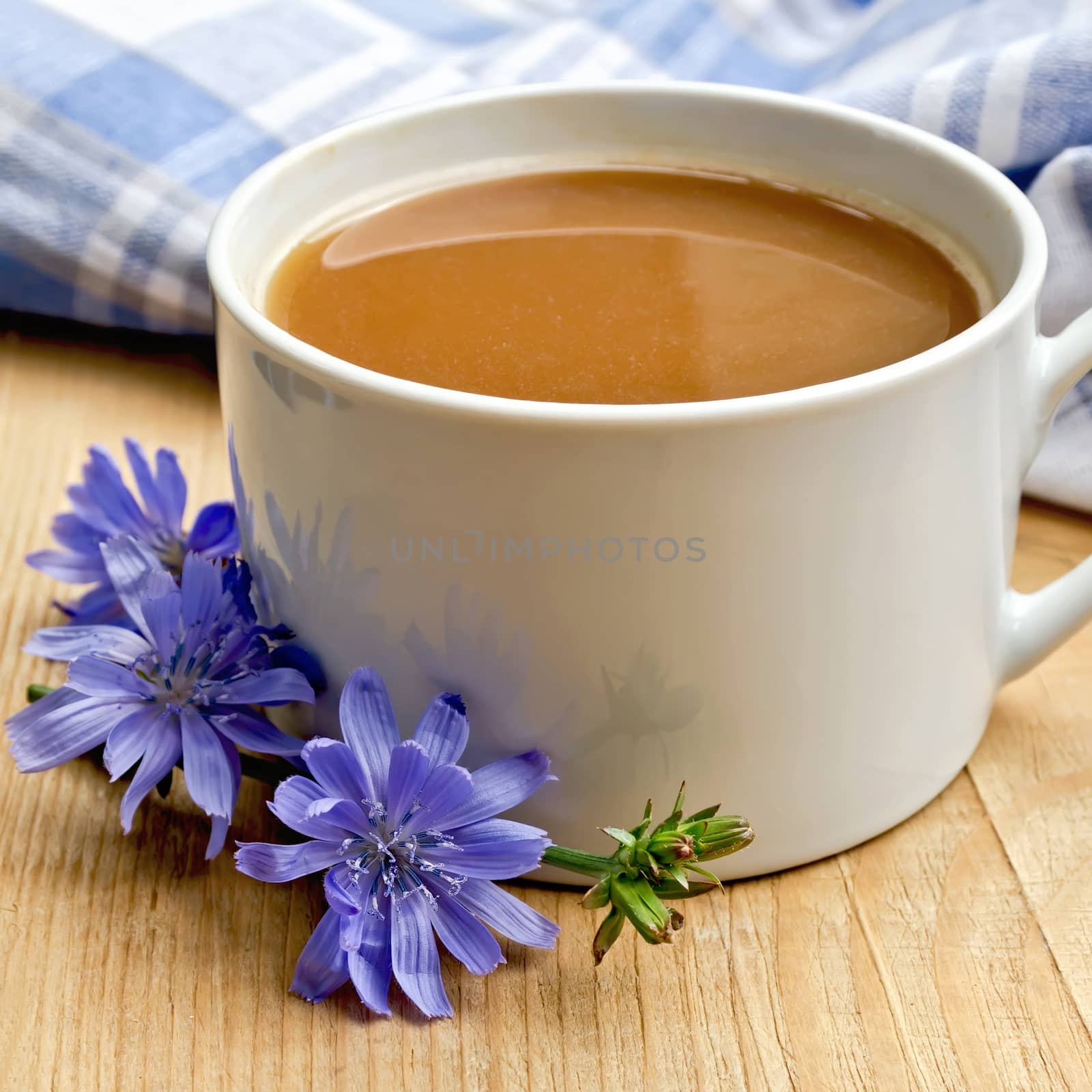 Chicory drink in white cup on board by rezkrr