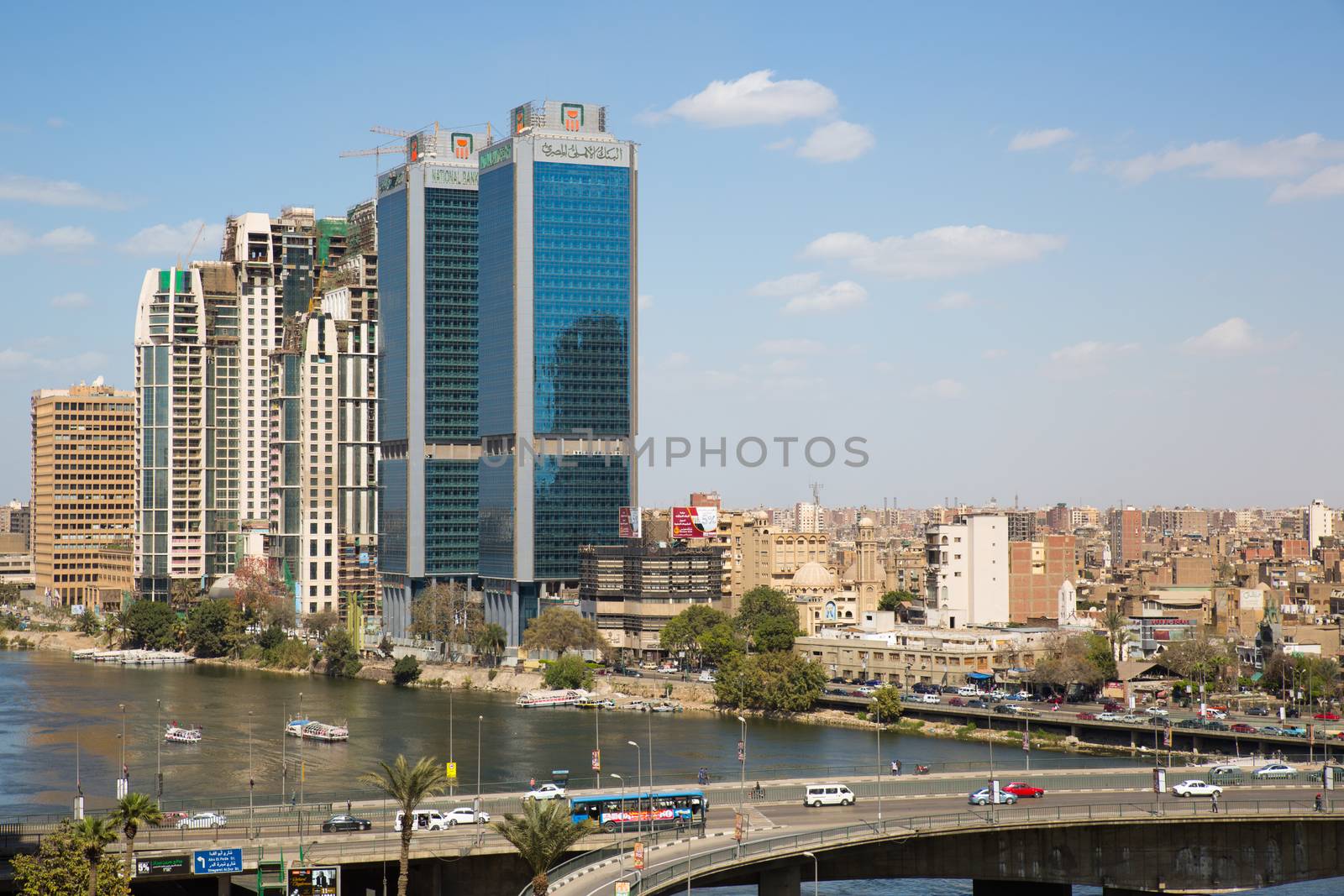 Cairo, Egypt - March 4, 2016: The 15th May bridge, the Nile river & the Corniche Street in central Cairo.