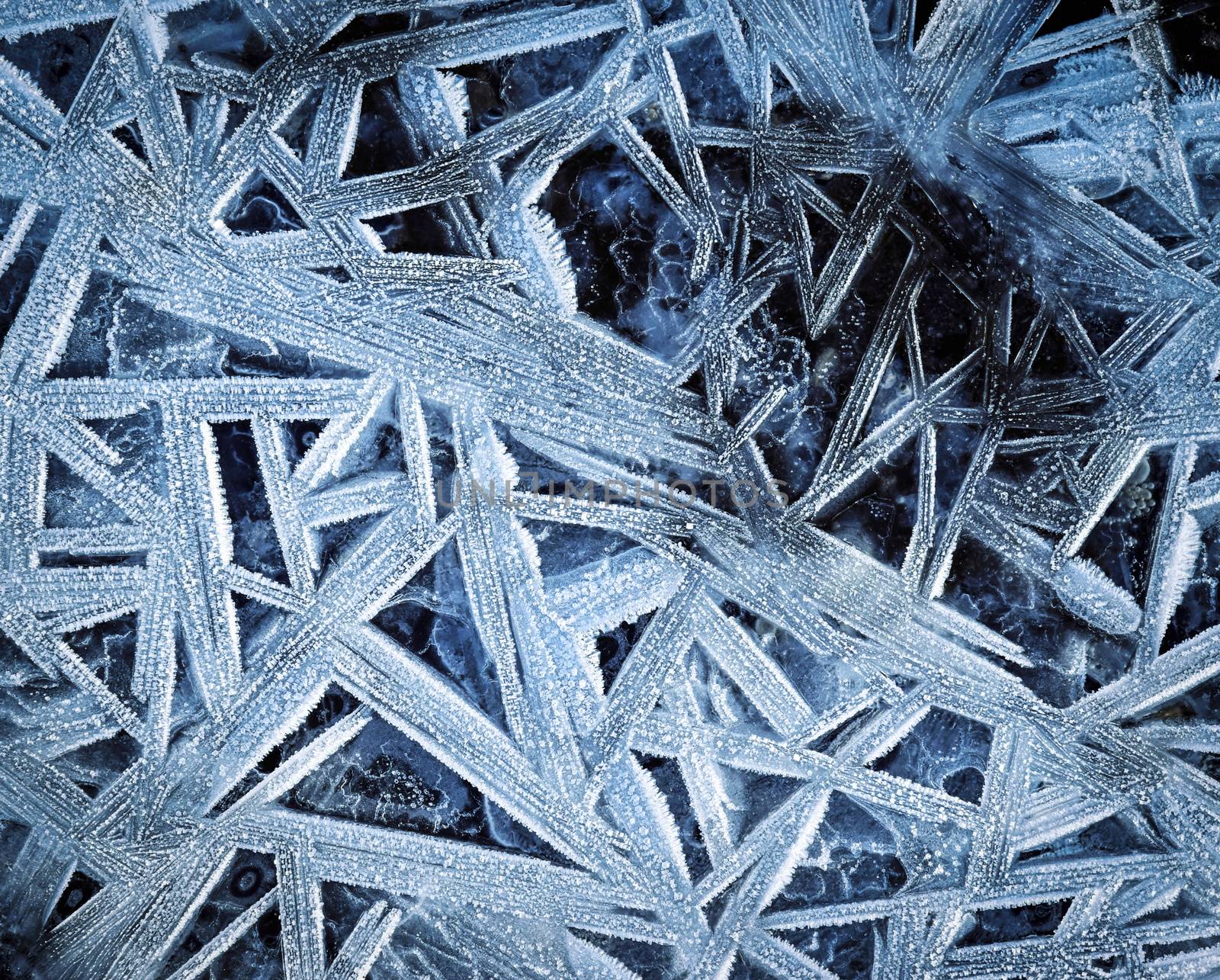 abstract winter background geometric shapes on the frozen water
