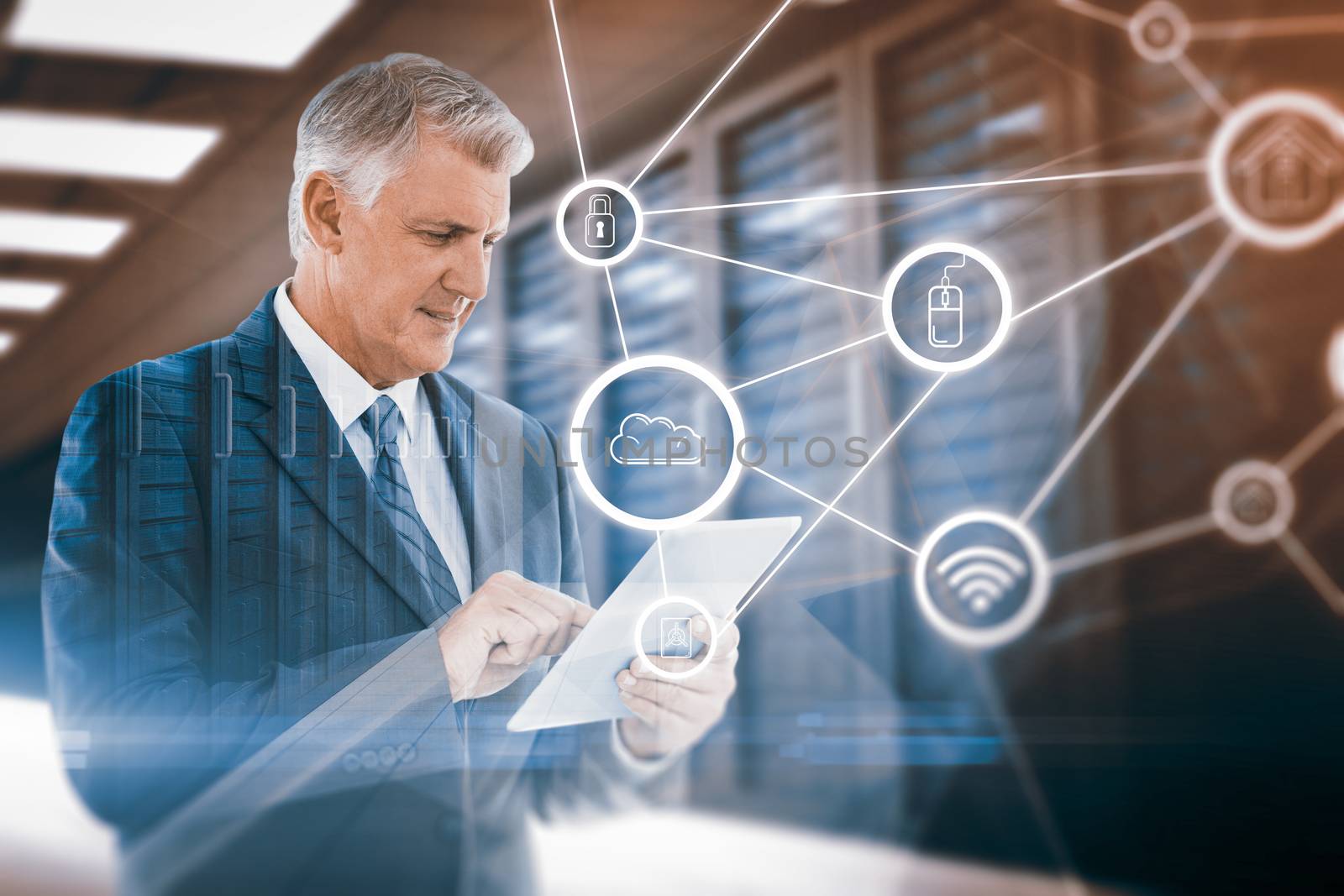 Composite image of businessman using his tablet  by Wavebreakmedia