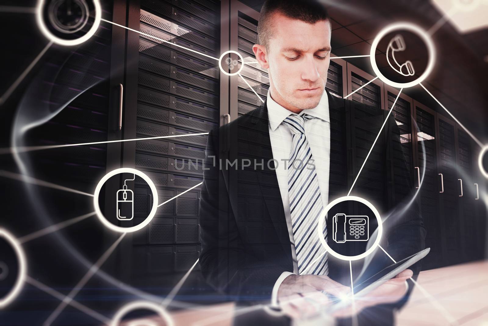 Businessman using tablet against abstract glowing black background