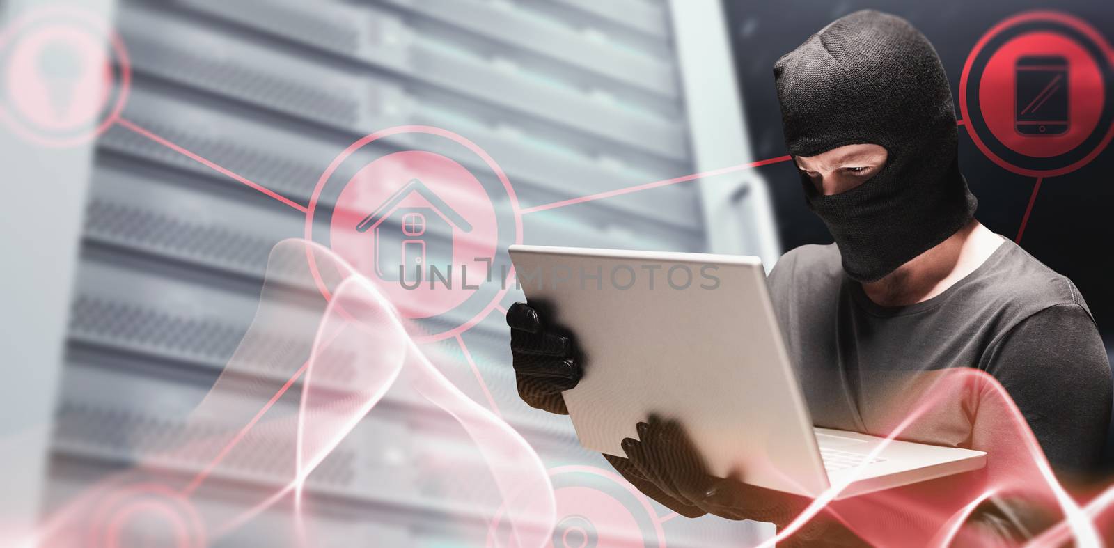 Composite image of hacker using laptop to steal identity by Wavebreakmedia