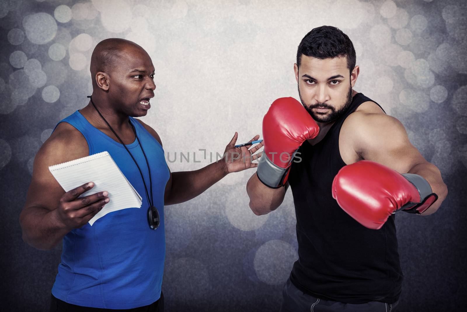 Boxing coach with his fighter against grey