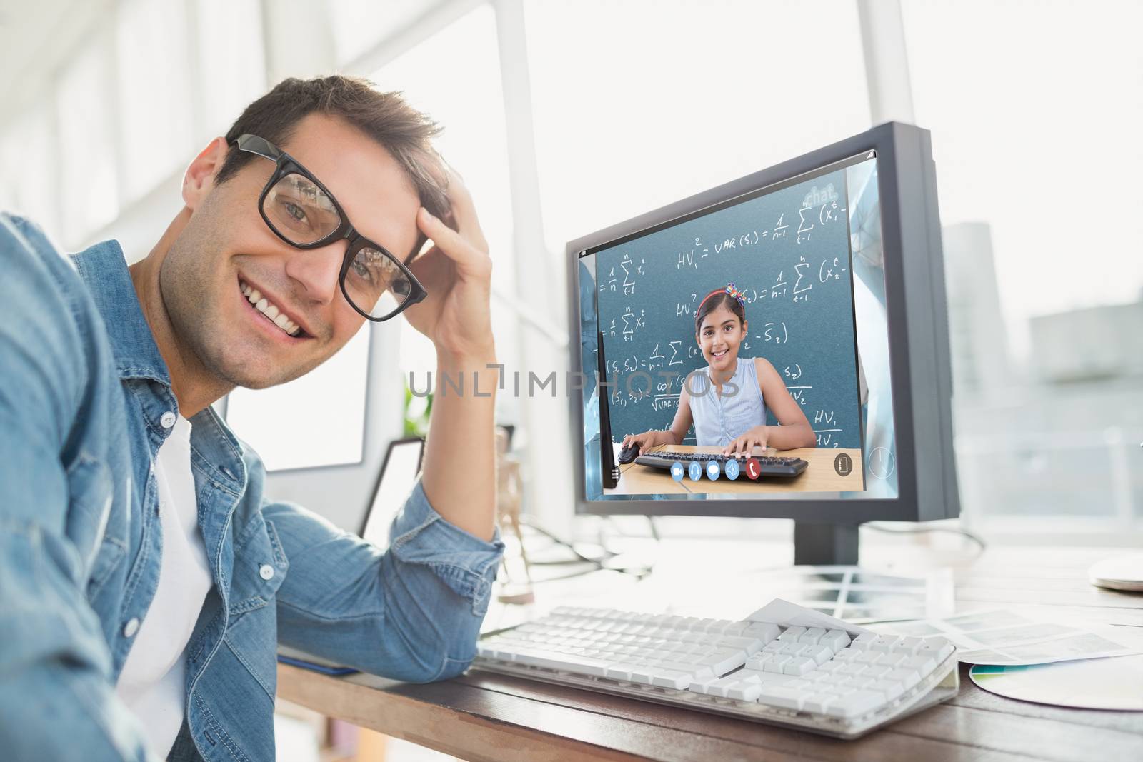  Portrait of a casual businessman posing and smiling against blue Portrait of a casual businessman posing and smiling in the office