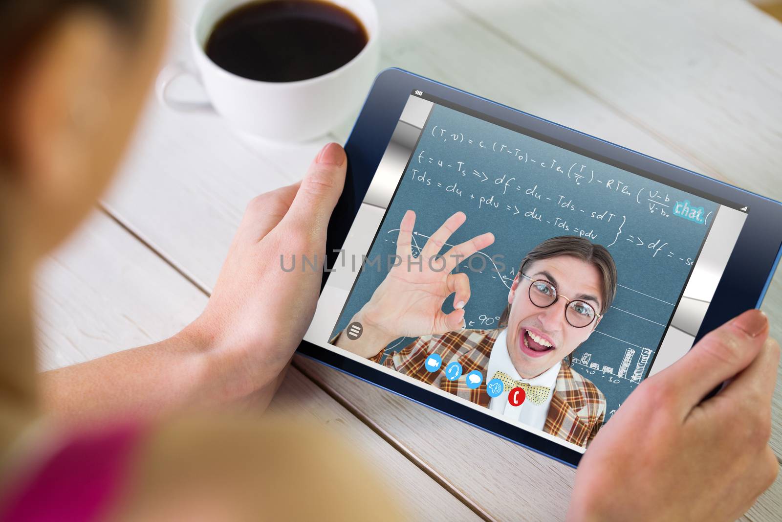 Woman using tablet pc against blue