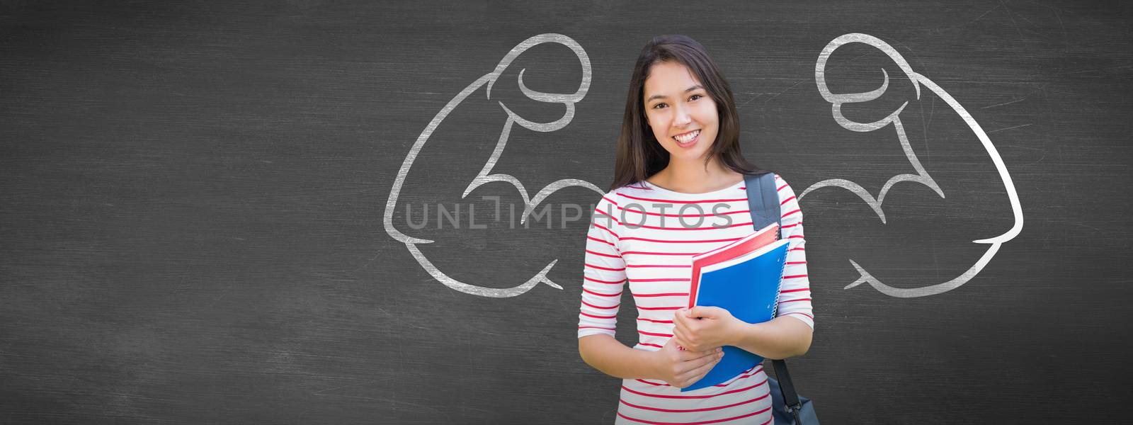 College girl holding books with blurred students in park against black background