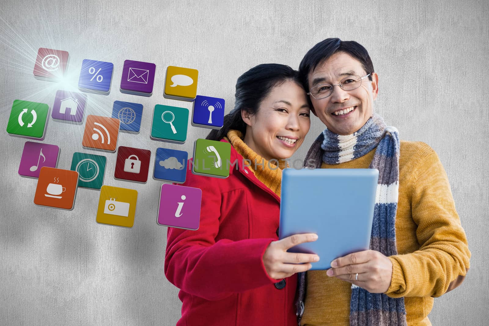 Composite image of asian couple on balcony using tablet by Wavebreakmedia