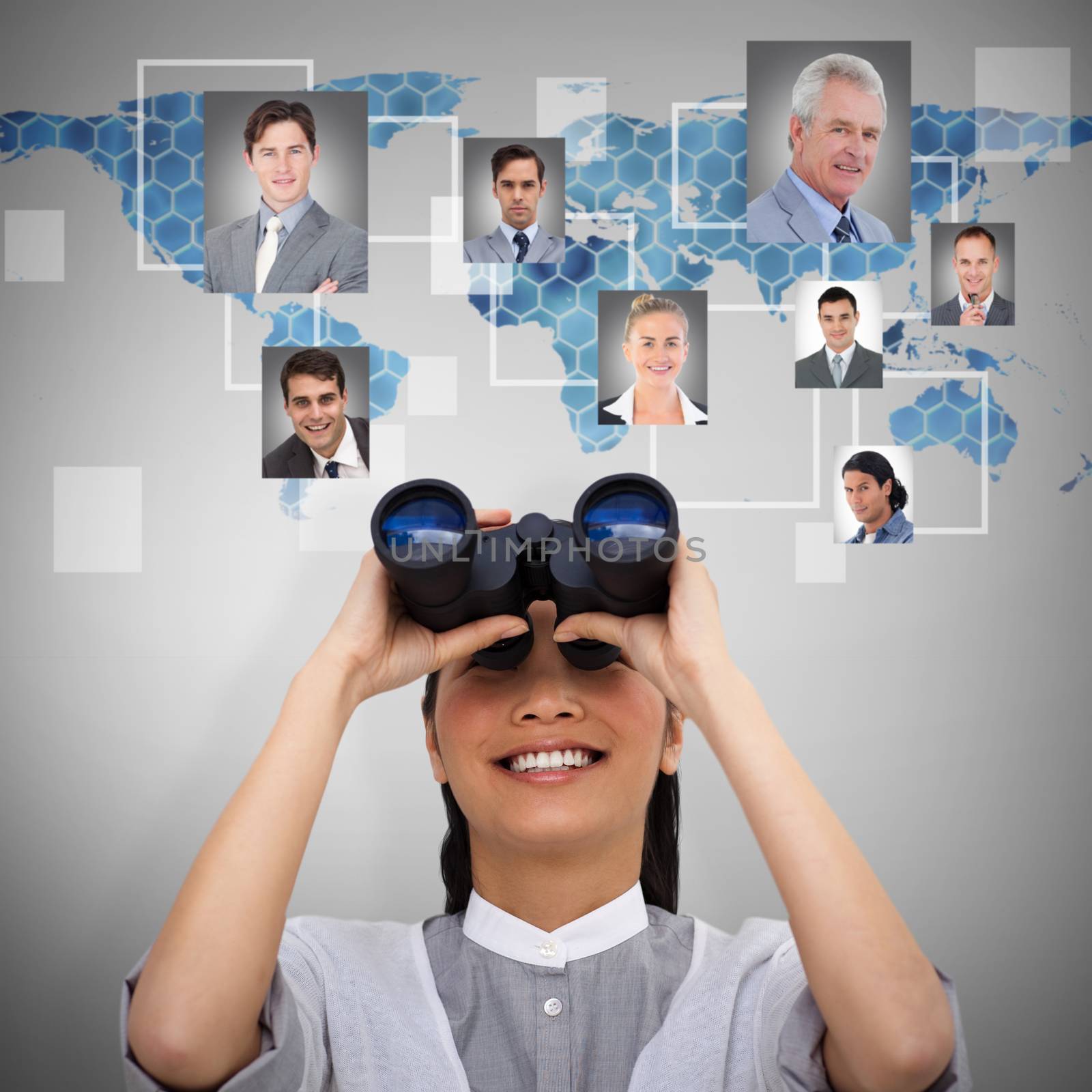 Composite image of visionary businesswoman looking through binoculars by Wavebreakmedia