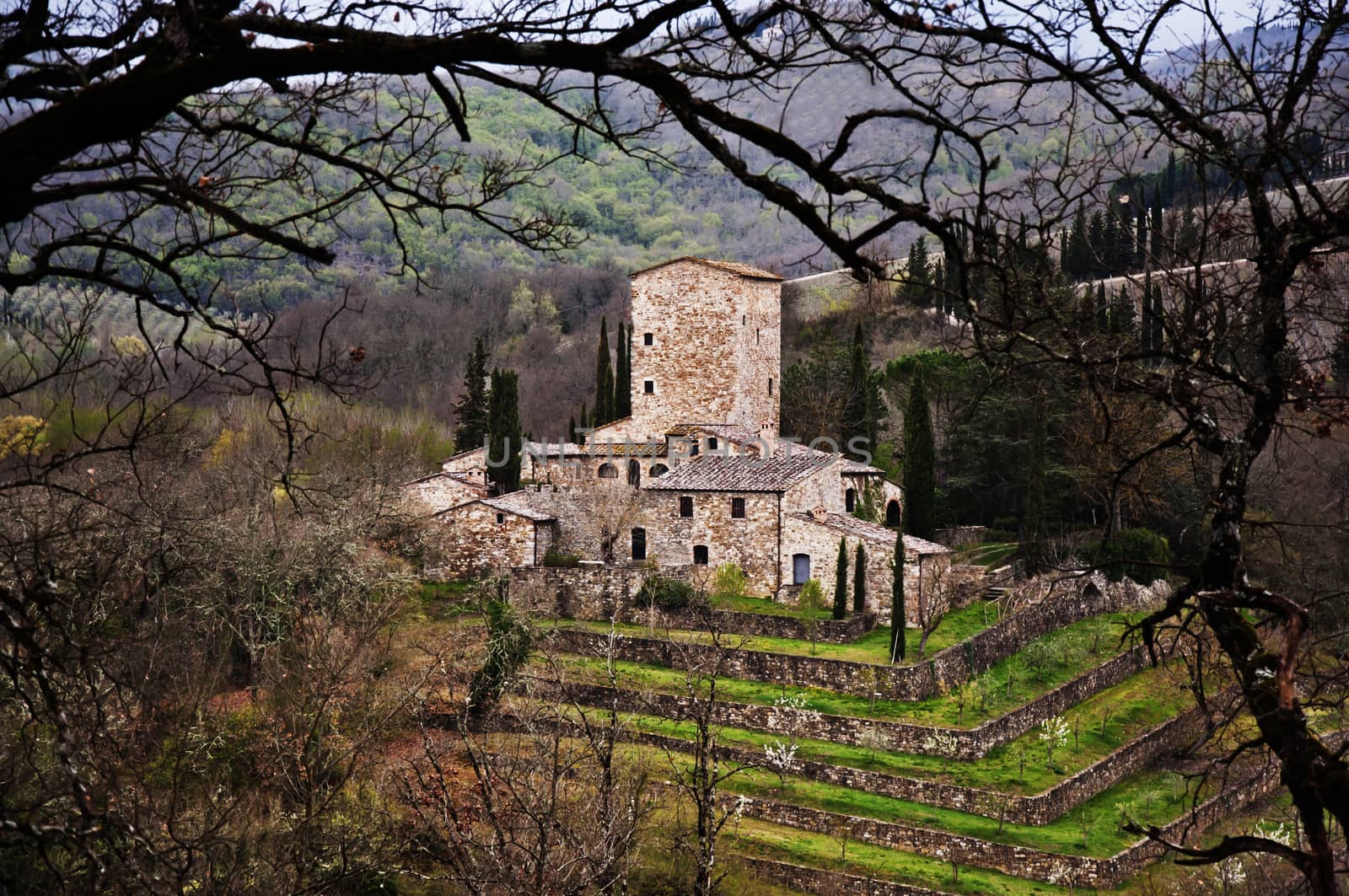 Tuscany landscape with typical old medieval house