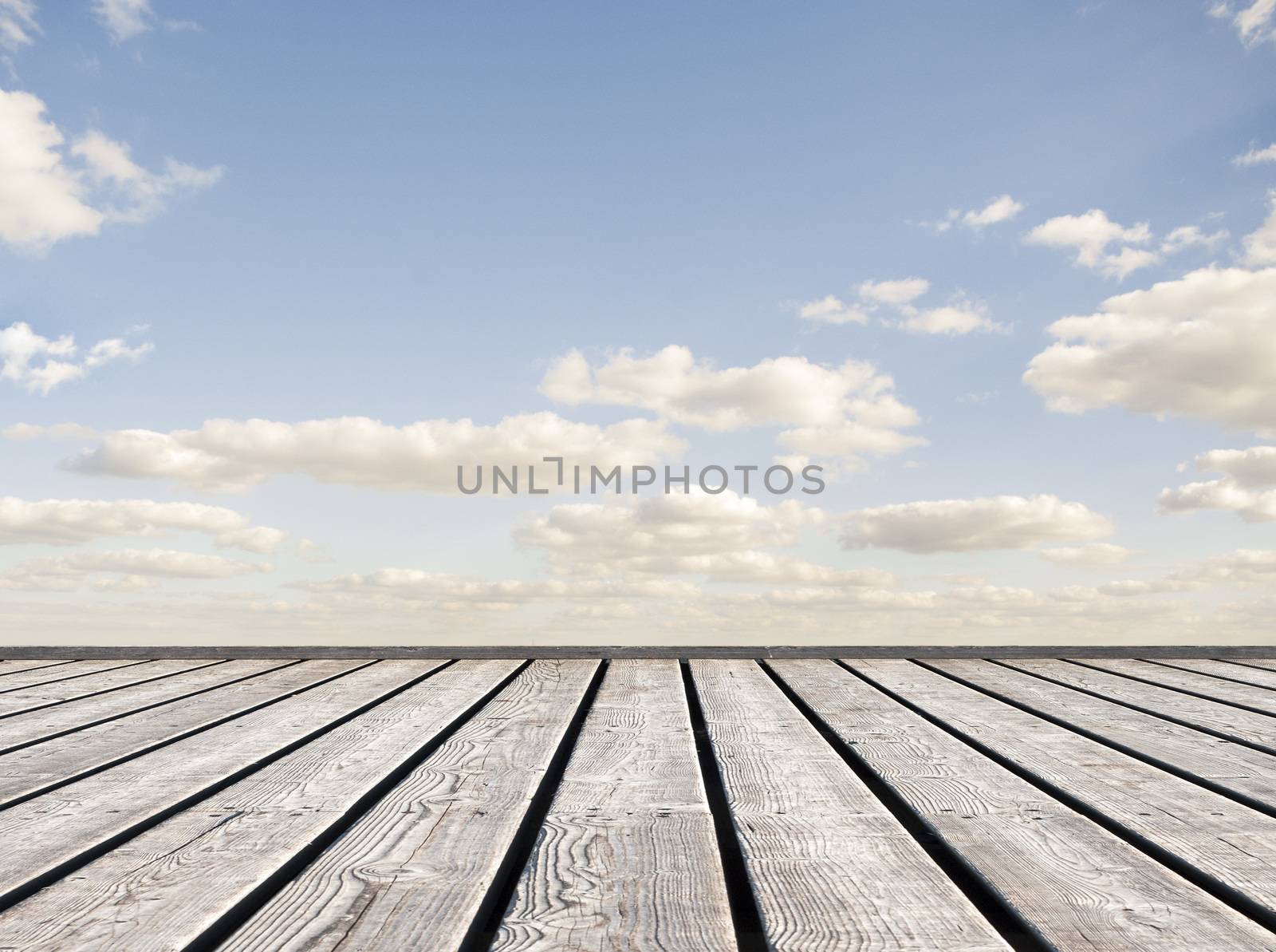 Wooden bridge leading to sky horizon background