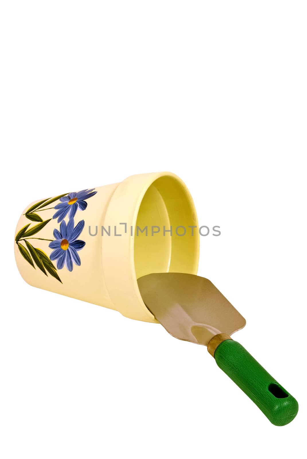 Horizontal shot of flower pot and trowel or shovel.  Isolated on white with lots of copy space