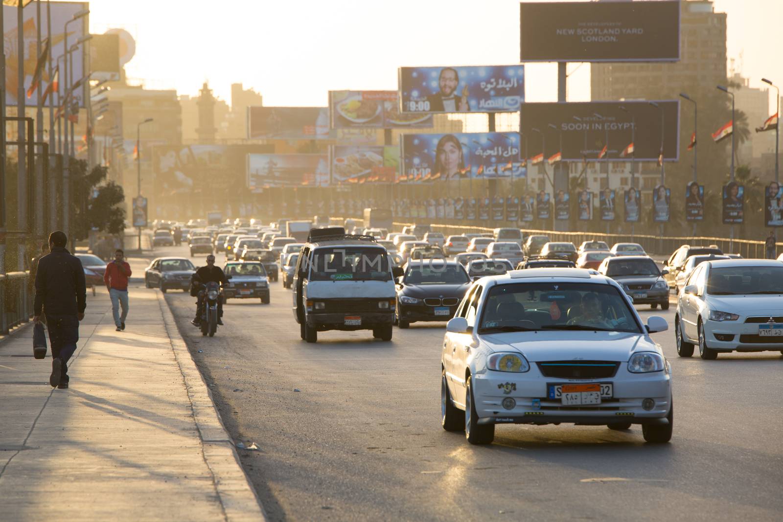 Cairo, Egypt - March 4, 2016: Heavy traffic on the 6th October bridge in central Cairo at dusk.