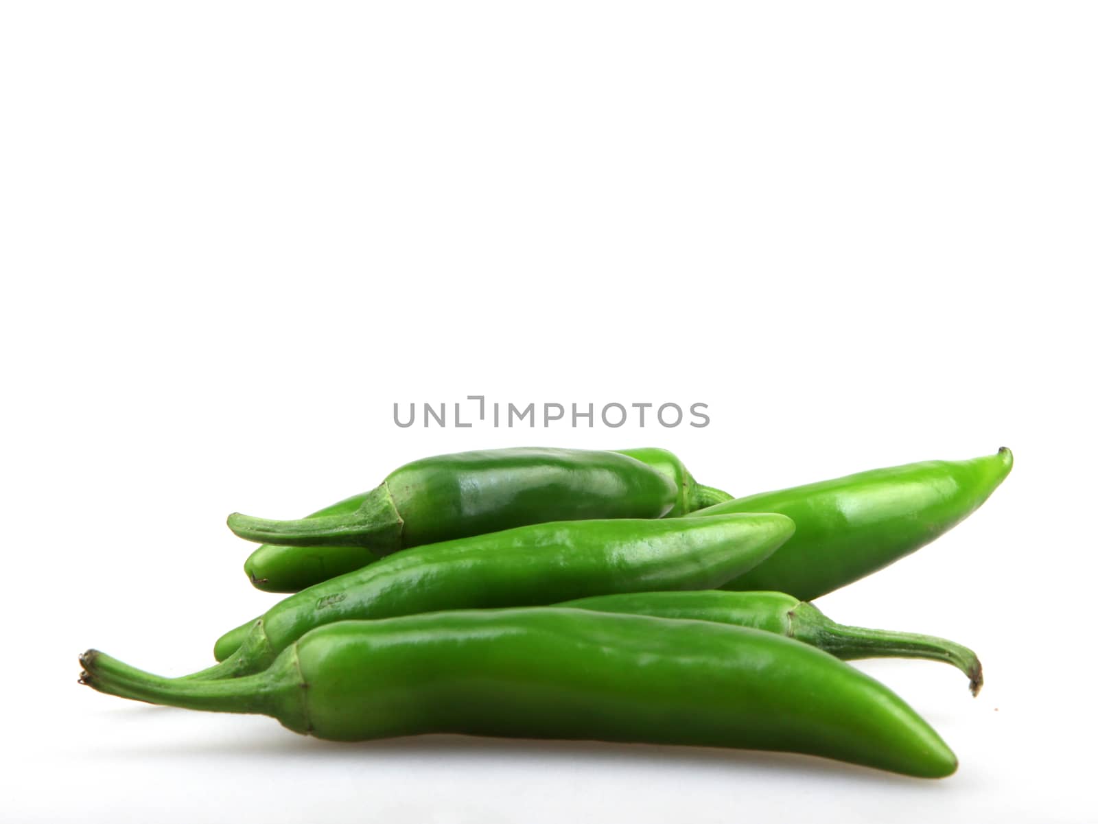 green pepper is isolated on a white background