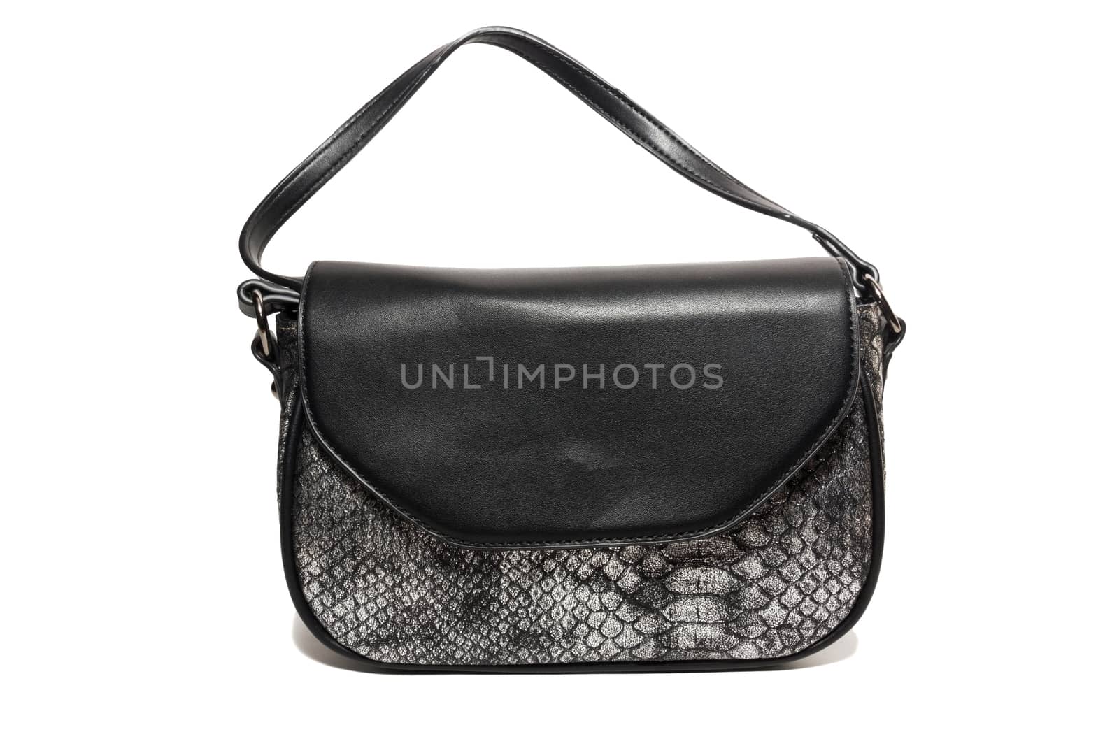 The photograph shows a female handbag on a white background