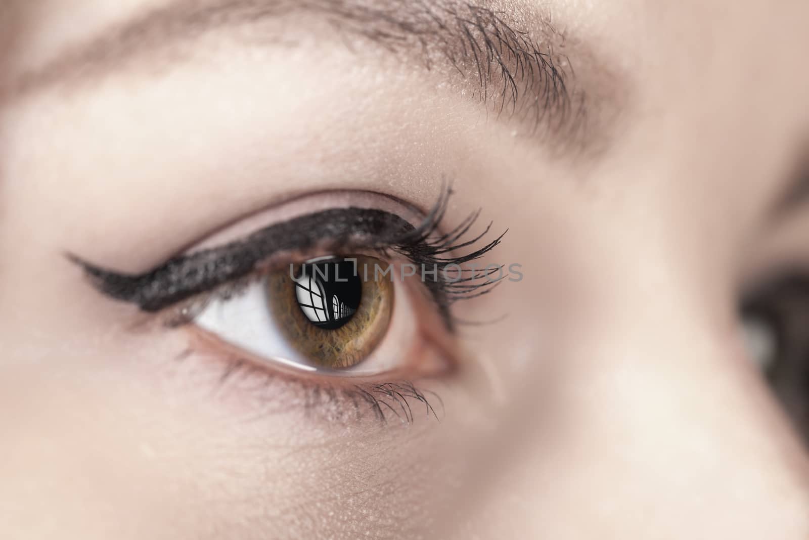 young woman in the makeup eyes closeup