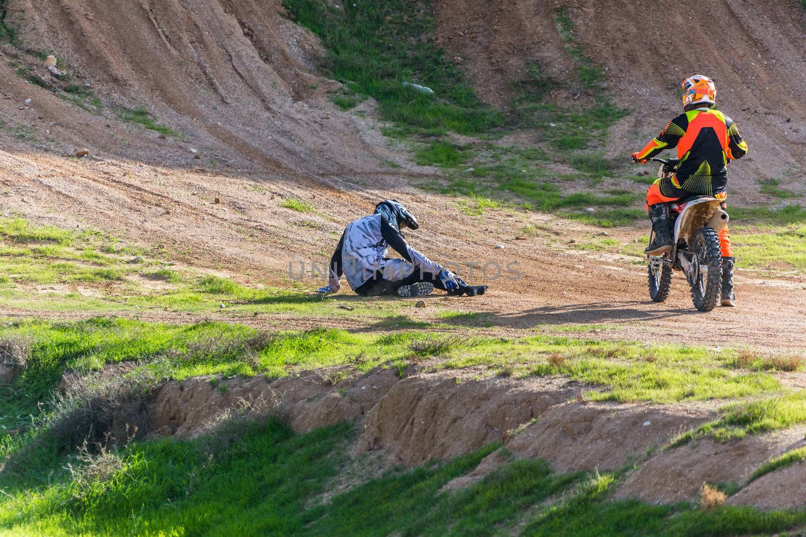 racer on a motorcycle in the desert summer day