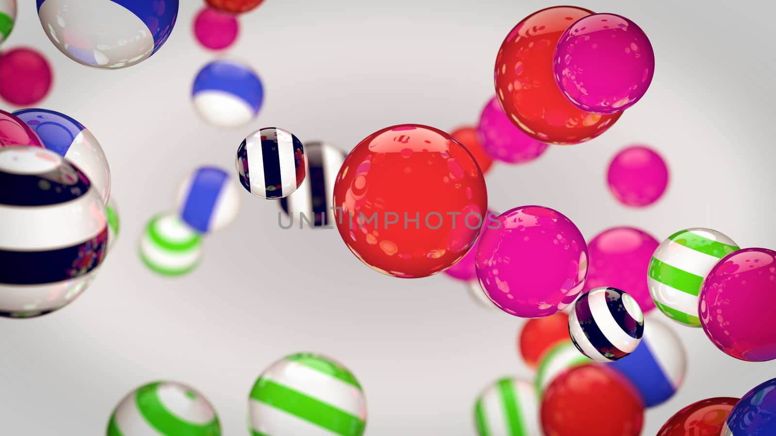 Abstract color striped spheres in air on white background