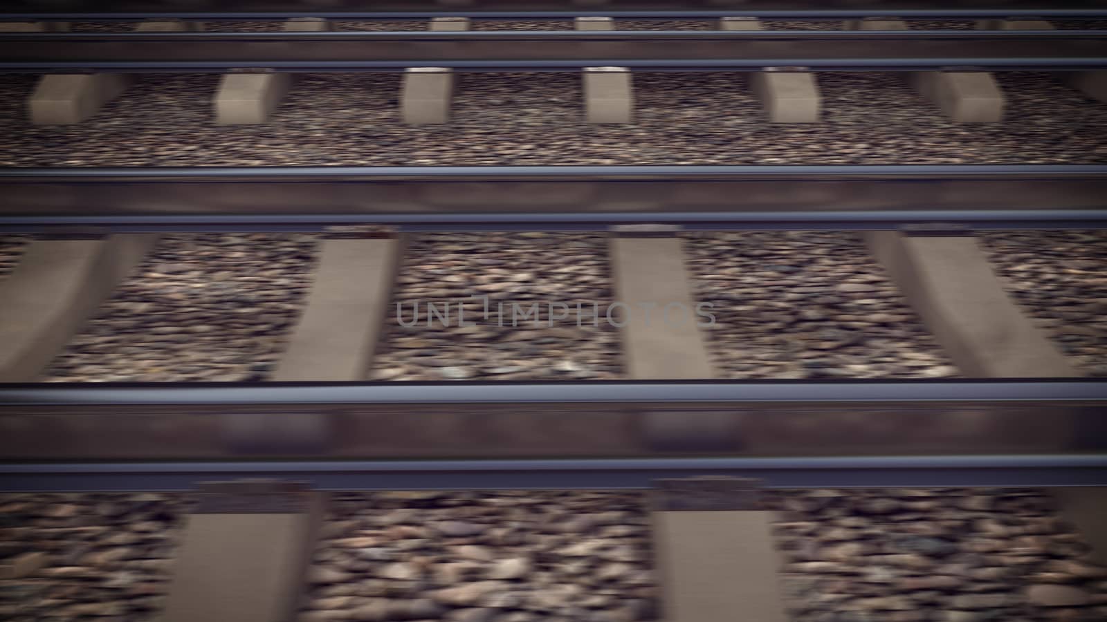 The railways for a train in motion blur.