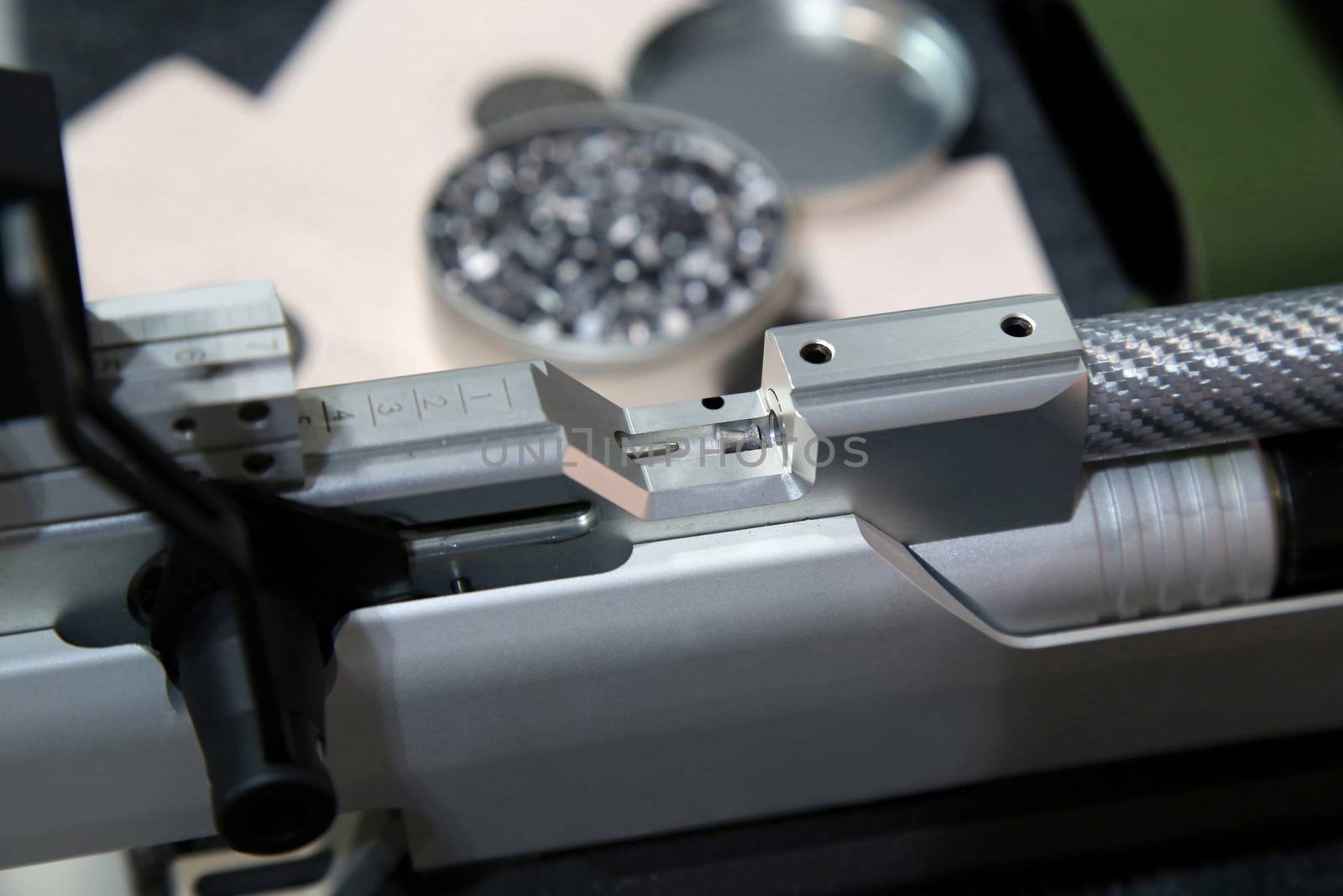 aluminum can of lead pellets for air rifle and air rifle