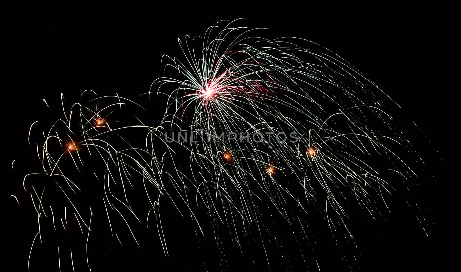 multicolored fireworks in the night sky