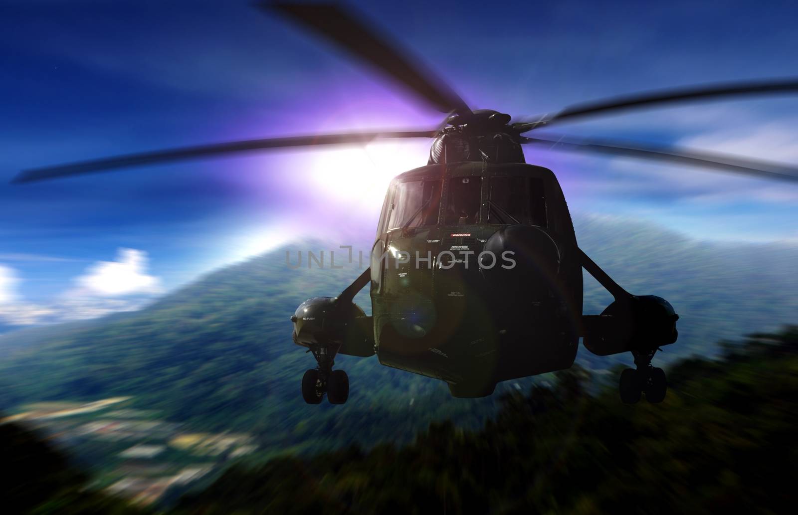 Helicopter on a rescue mission in a mountain