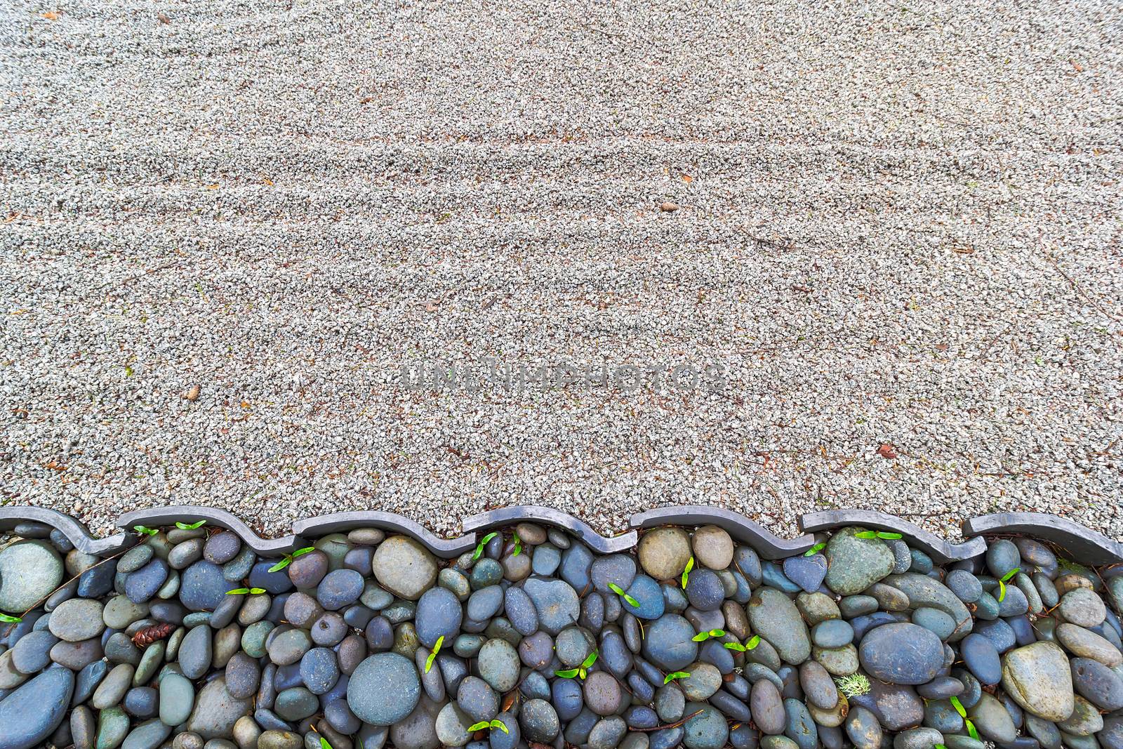 Sand Garden with Pebble Stones and Roof Tiles Border at Japanese Garden