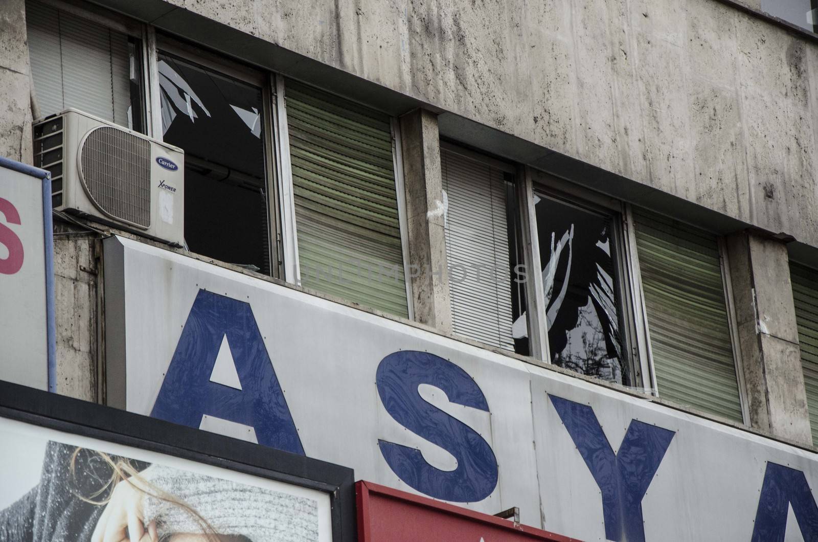 TURKEY, Ankara: Shattered windows are seen at the scene of  a car bombing in Guven Park in the Kizilay district, a key transport hub of the Turkish capital city Ankara on March 14, 2016, one day after a car bomb exploded in Ankara  killing at least 32 people and wounding more than 100, according to the health ministry. On February 2016, a bomb attack claimed by a Kurdish militant group on a military convoy in Ankara killed 28 people and wounded dozens more. On October 2015, more than 100 people were killed in a double-suicide bombing at a Kurdish peace rally in Ankara. 