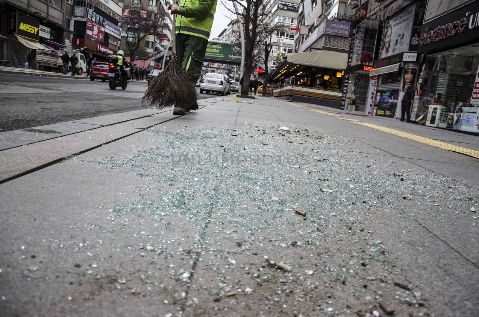 TURKEY, Ankara: Shattered glass is seen at the scene of  a car bombing in Guven Park in the Kizilay district, a key transport hub of the Turkish capital city Ankara on March 14, 2016, one day after a car bomb exploded in Ankara  killing at least 32 people and wounding more than 100, according to the health ministry. On February 2016, a bomb attack claimed by a Kurdish militant group on a military convoy in Ankara killed 28 people and wounded dozens more. On October 2015, more than 100 people were killed in a double-suicide bombing at a Kurdish peace rally in Ankara. 