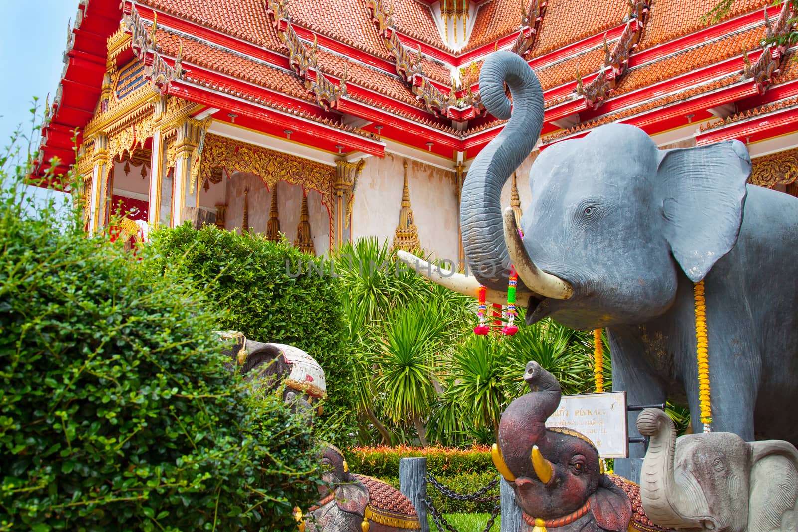 Phuket, Thailand - December 23, 2015: Thai Wat Chalong square with holy animals symbols