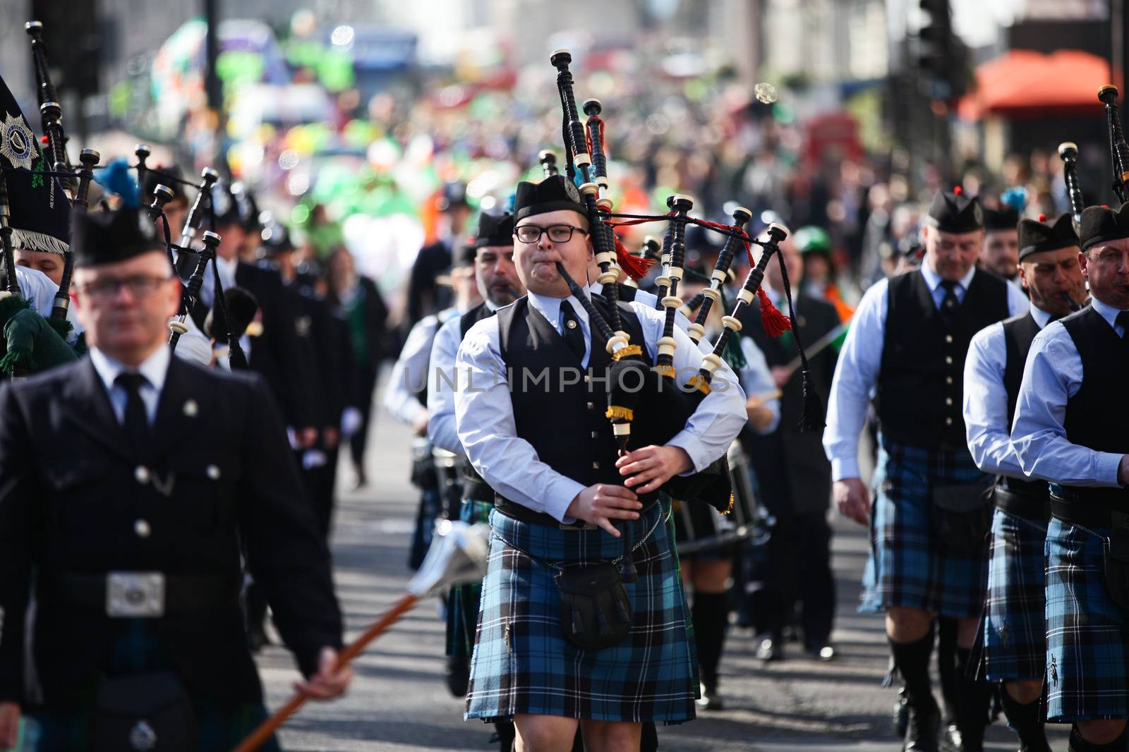 UNITED KINGDOM, London: Bagpipe players are pictured during St Patrick's Day parade near Trafalgar Square in London on March 13, 2016.