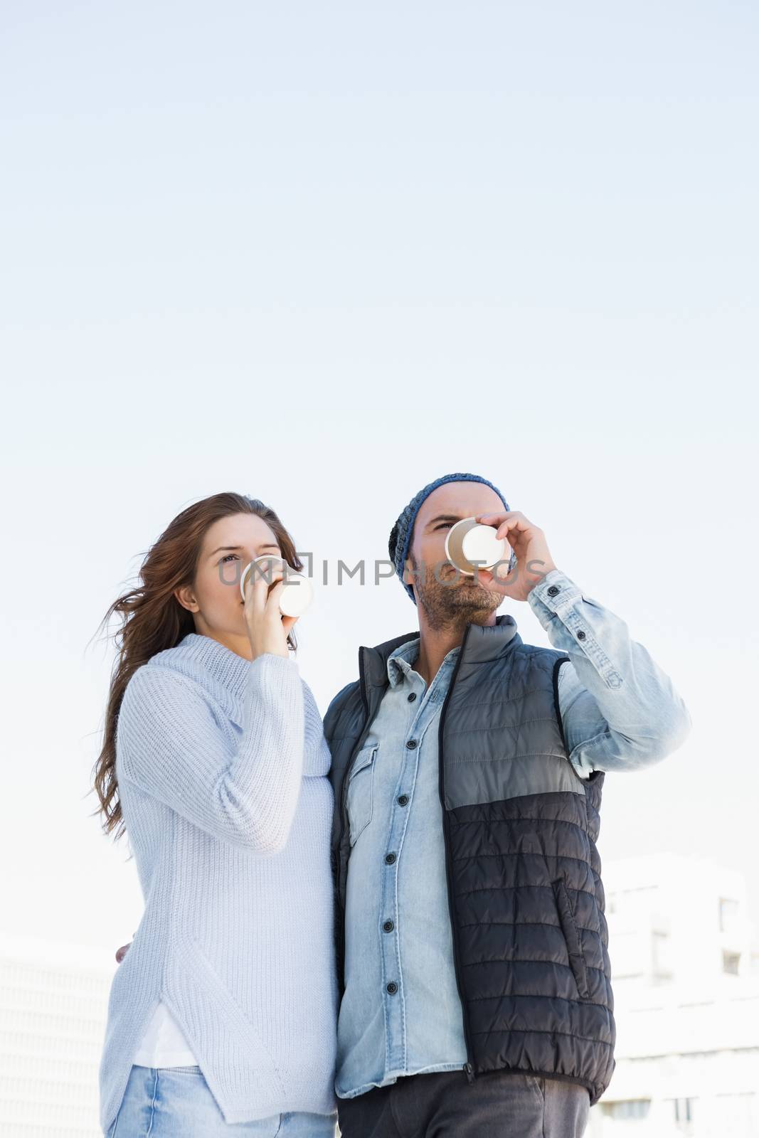 Young couple having coffee by Wavebreakmedia