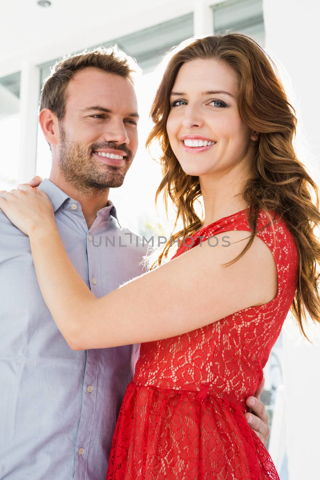 Happy young couple embracing each other