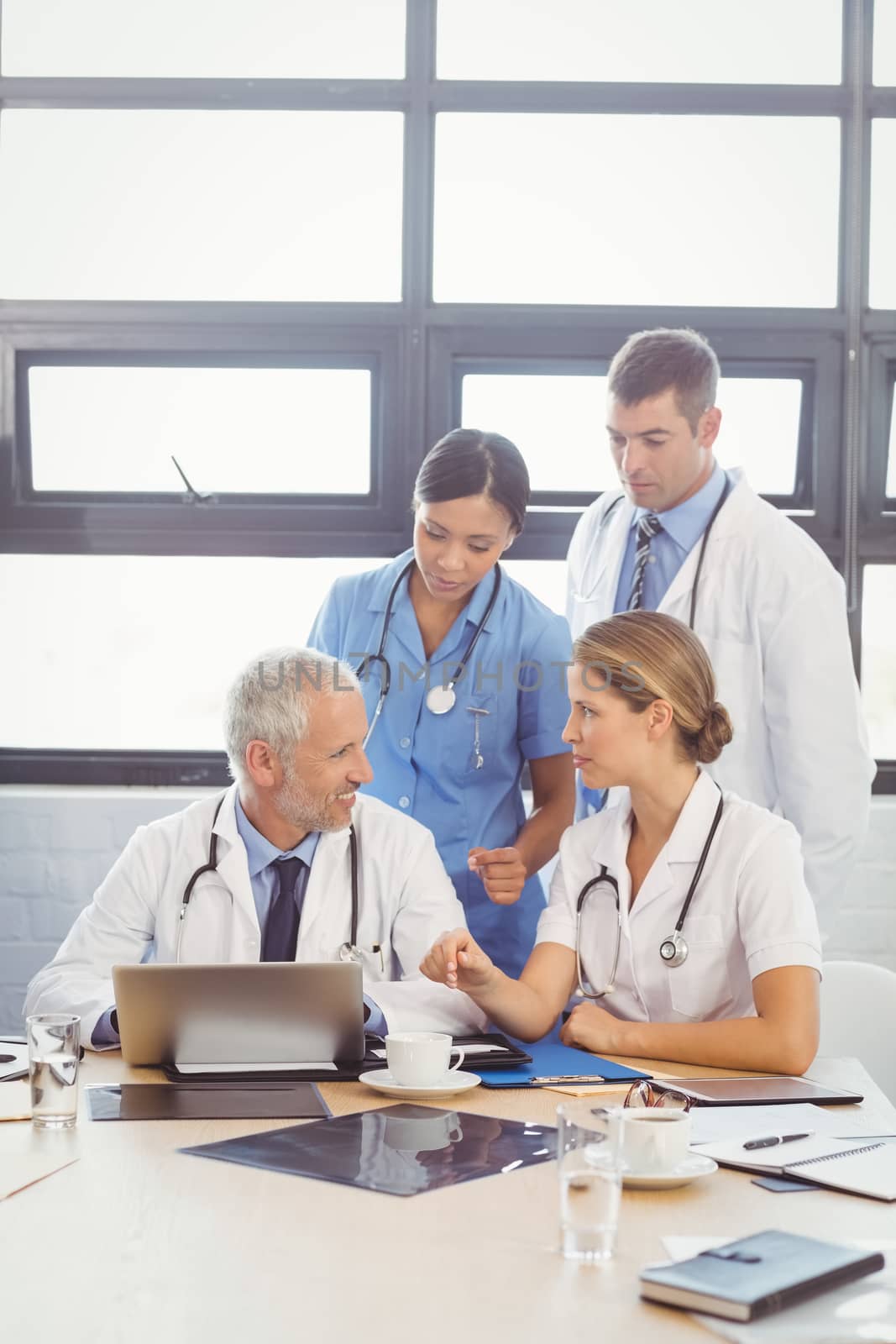 Medical team interacting at a meeting in conference room