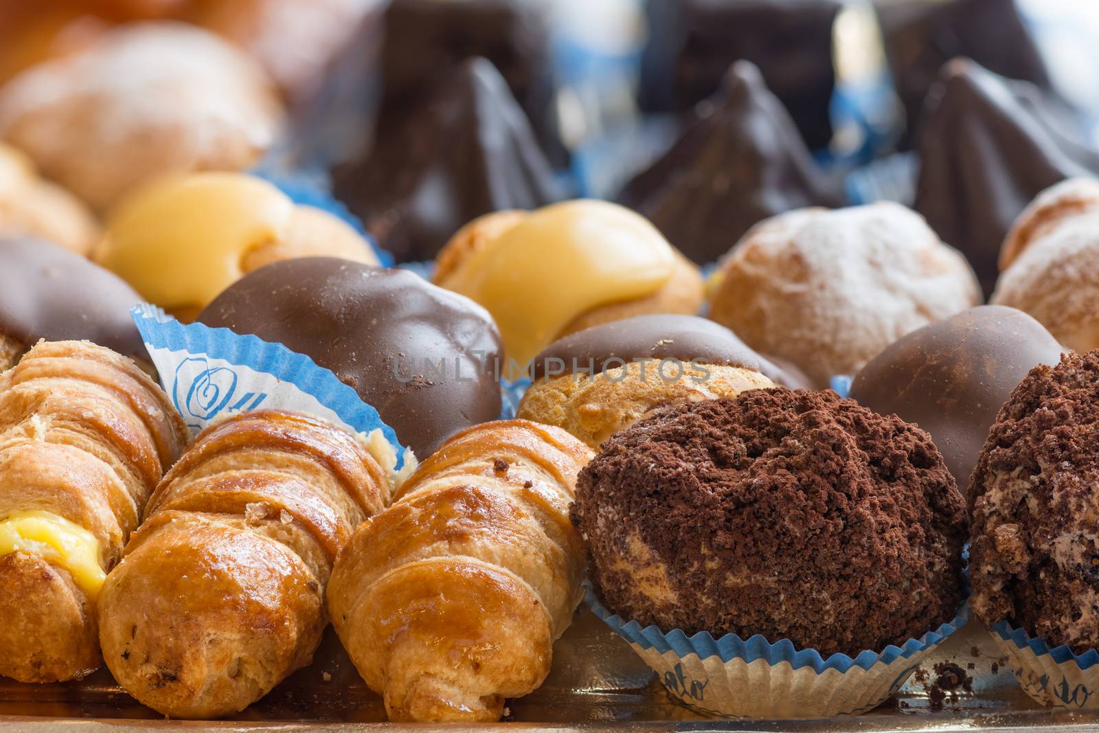 In the pictured colorful pastries with candied,cream and chocolate, the real Italian confectionery.