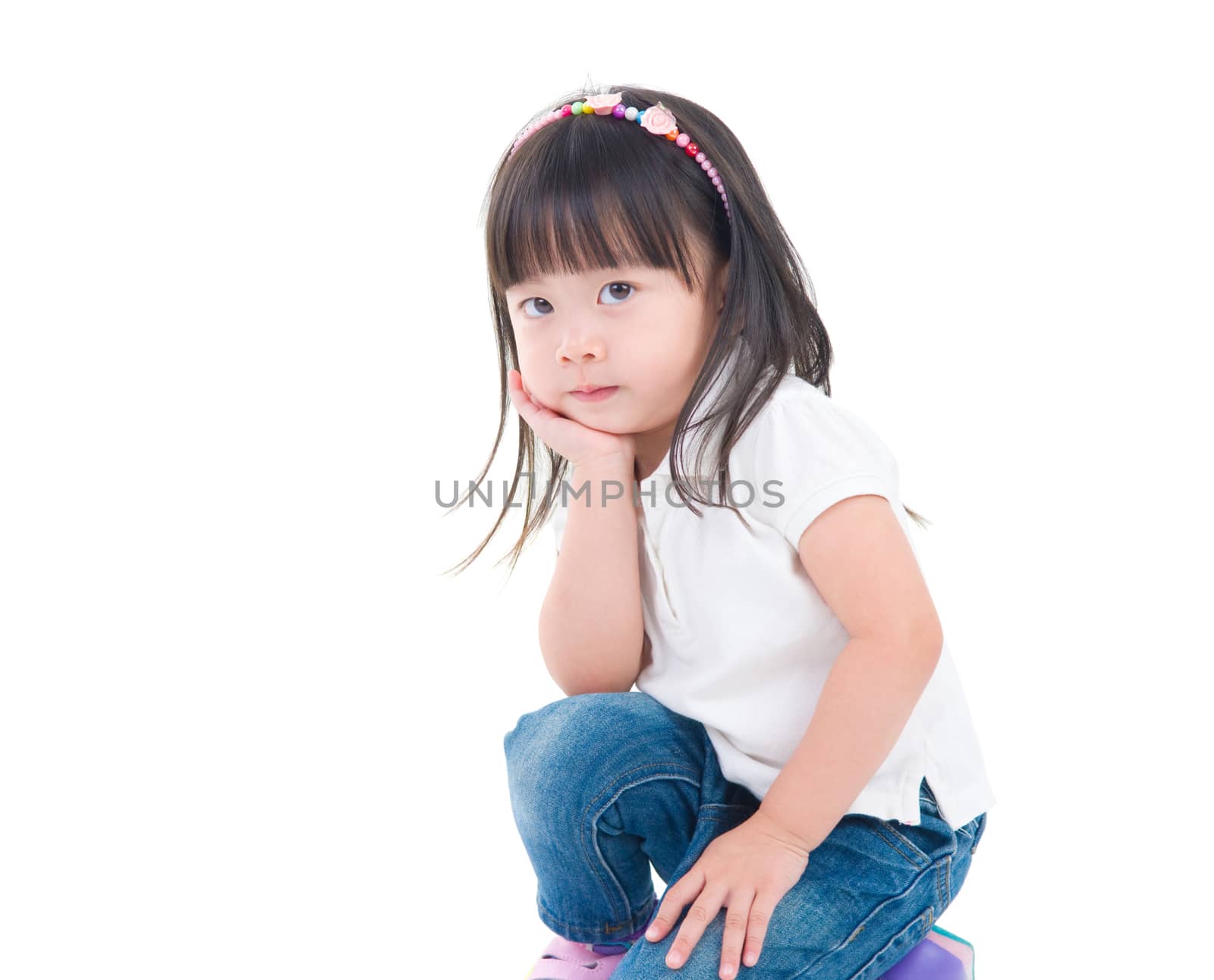 Little asian girl posing isolated on white background